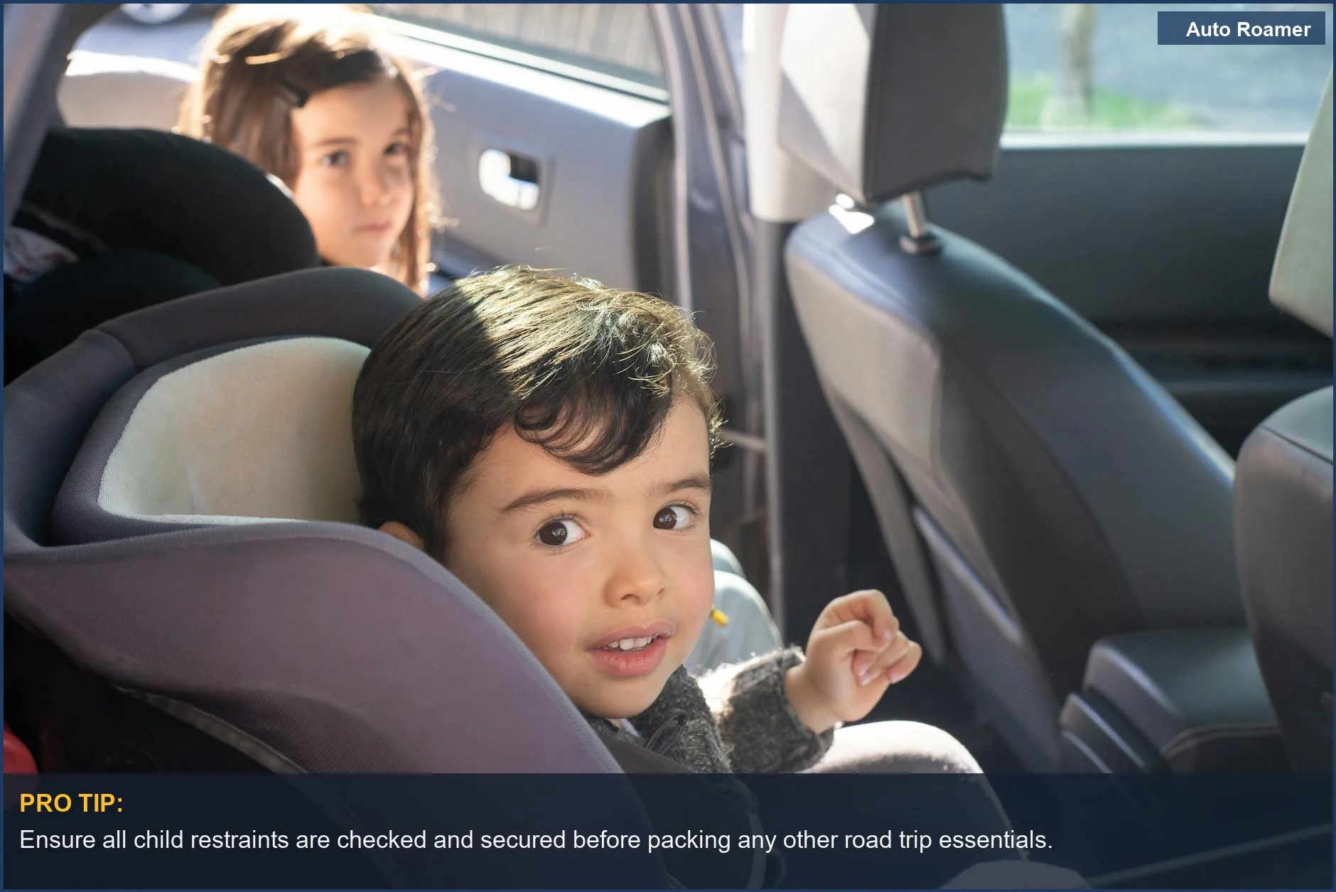 Two children enjoying a scenic drive in Portugal, with road trip essentials in mind.