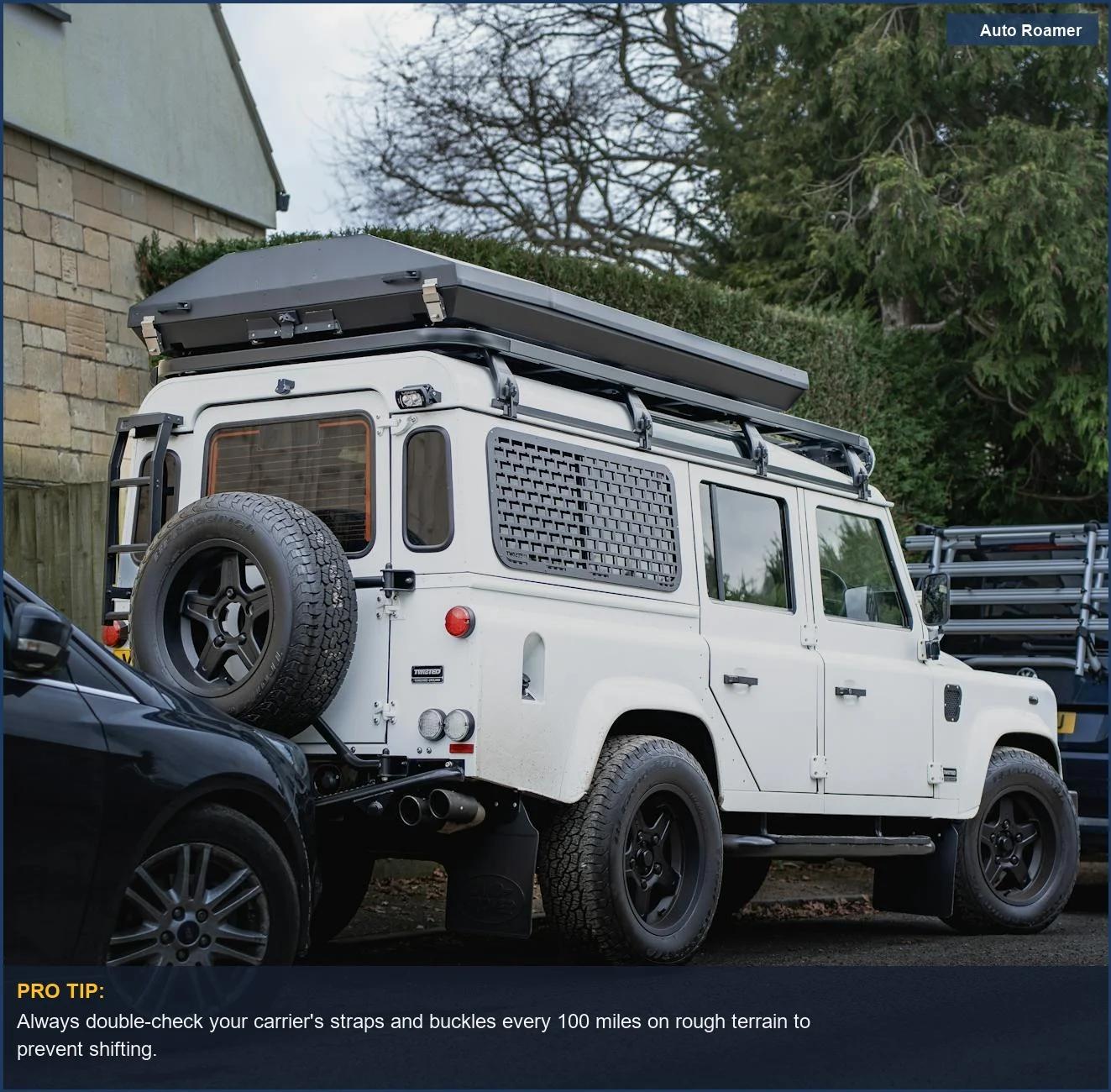 Sturdy white off-road vehicle parked on a scenic rural road, showcasing its adventurous spirit and cargo carrier.