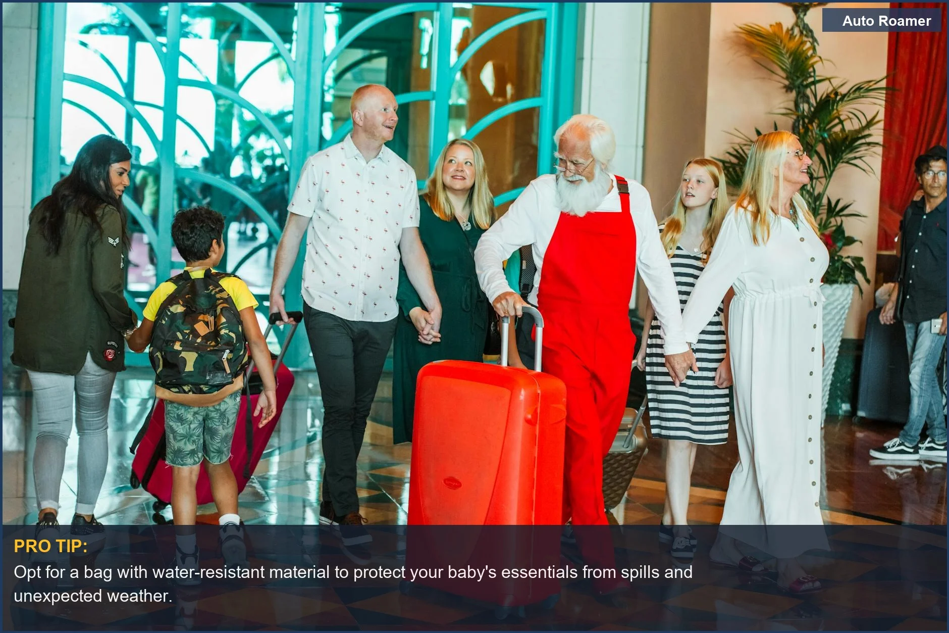 Diverse family arrives at a Dubai hotel with bright luggage, symbolizing the joy of family travel with convenient baby bags.
