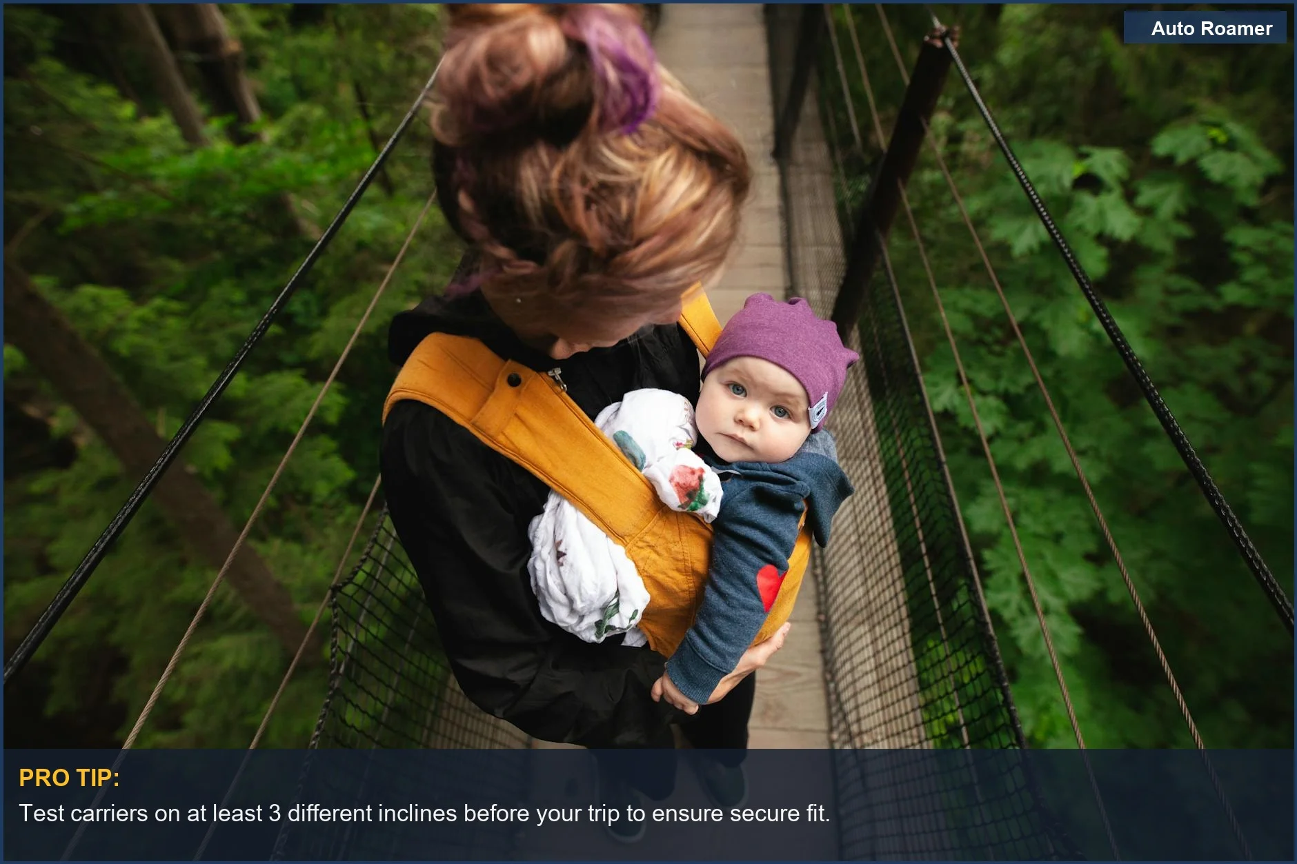 Woman carrying her baby across a forest suspension bridge, highlighting adventure and maternal care on the go.