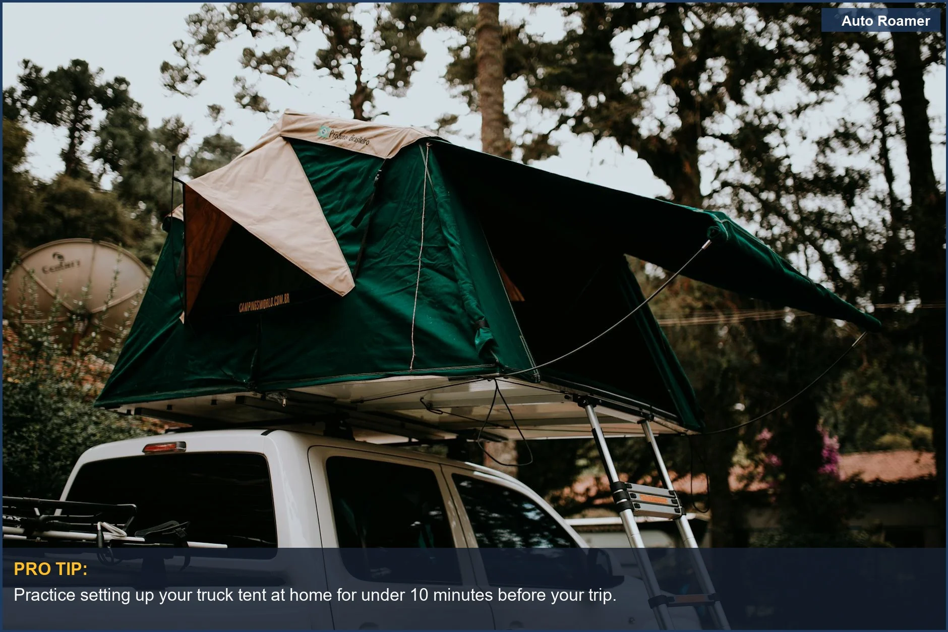 Pickup truck with a rooftop tent exploring scenic wilderness for ultimate outdoor camping.
