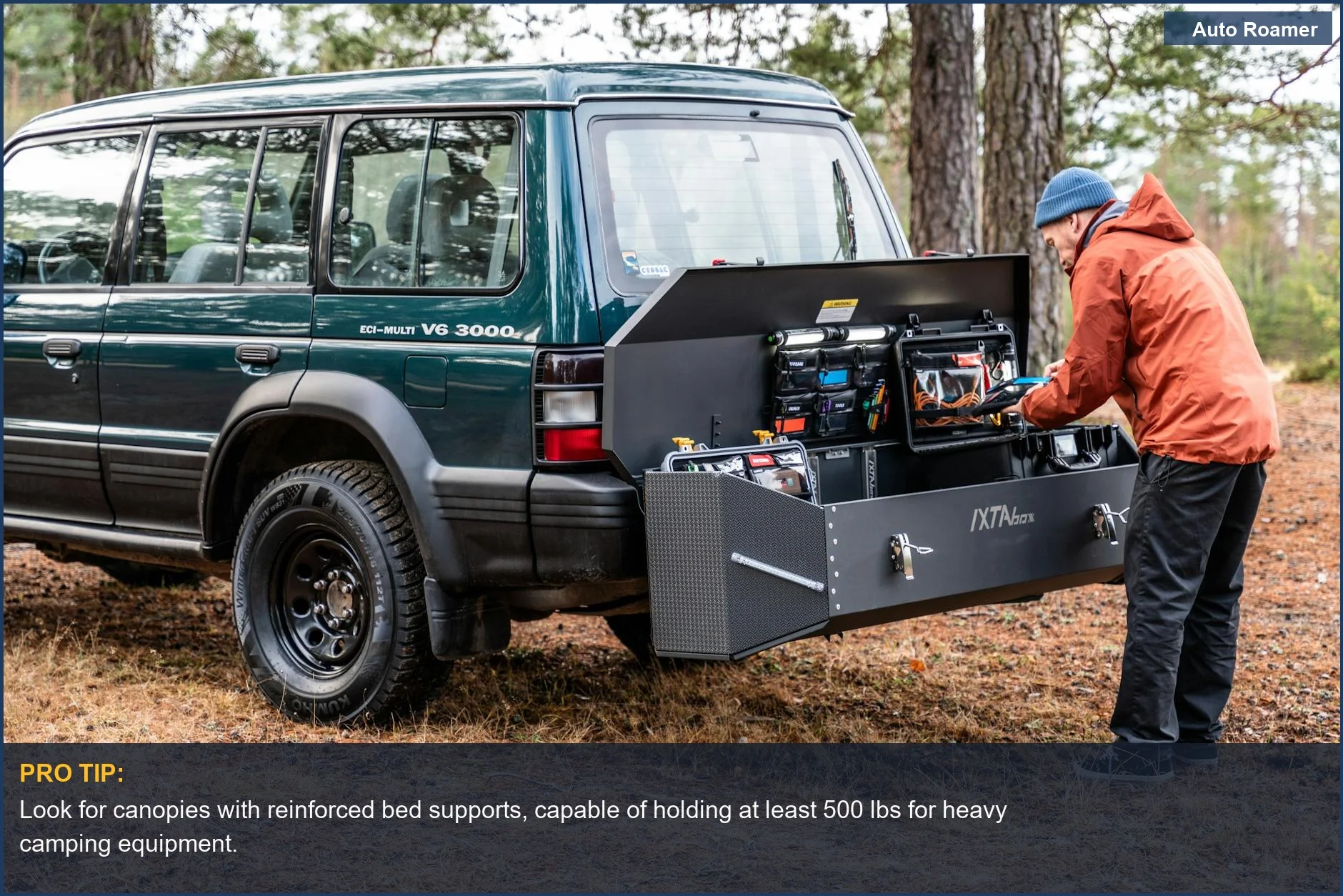 Rugged pickup truck with a versatile storage canopy parked in a dense forest during an outdoor adventure.