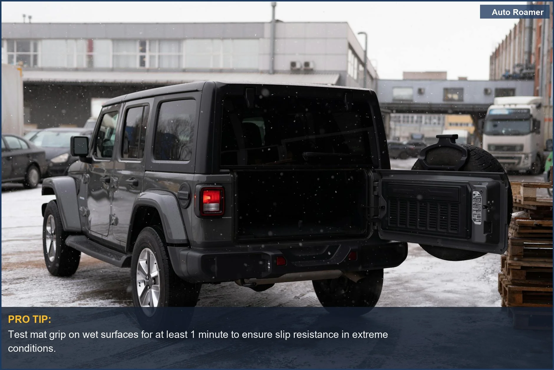 Black SUV with door open in snowy industrial area, showcasing robust WeatherTech floor mats for SUV durability.