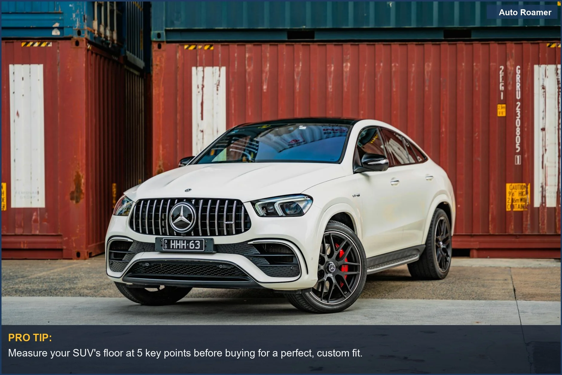 Elegant white Mercedes SUV parked near colorful cargo containers, highlighting premium WeatherTech floor mats for SUV style.