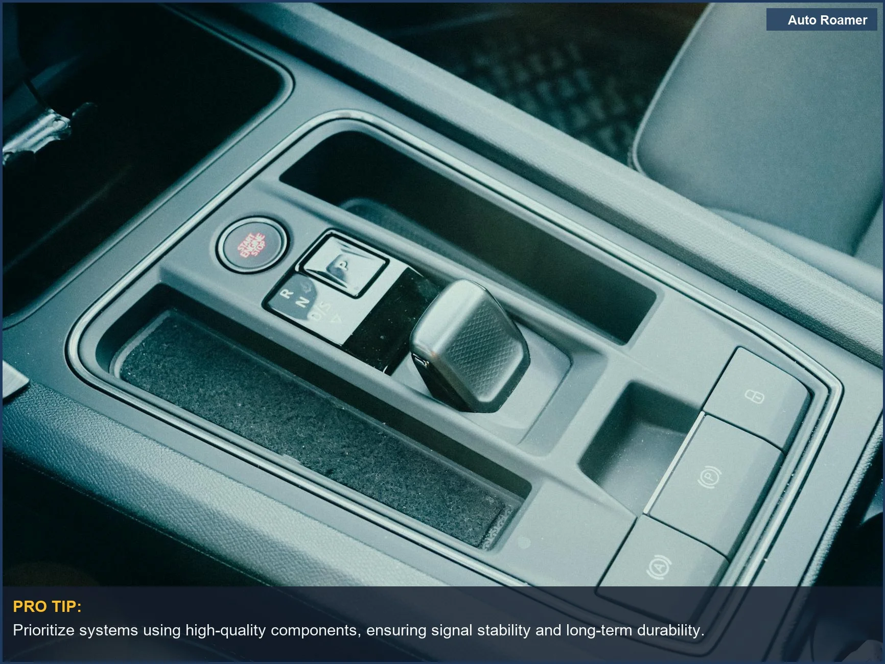 Close-up of modern car gear shift, emphasizing advanced automotive technology in wireless backup camera systems.