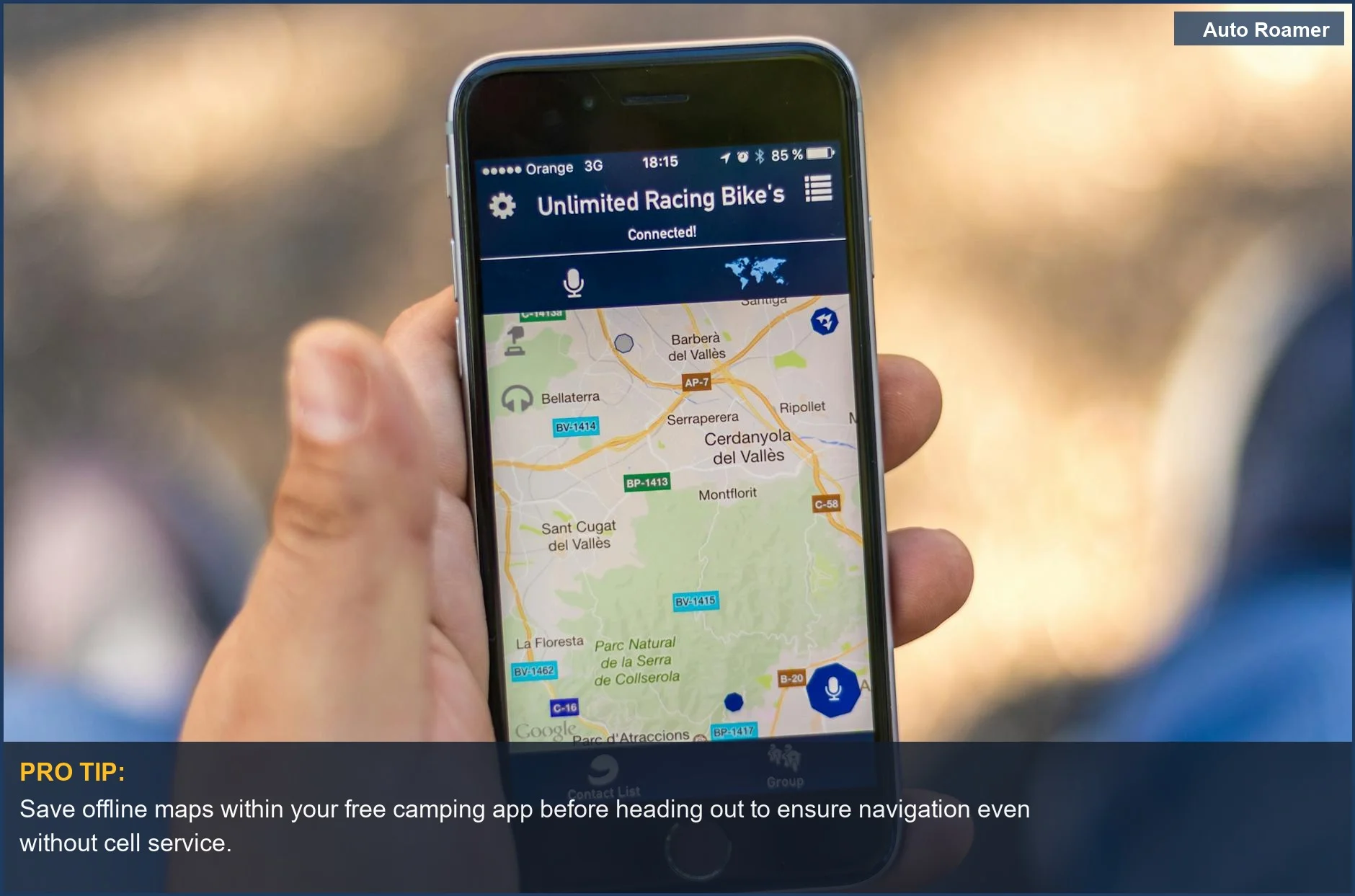 Person using a free camping app on a smartphone to find dispersed camping locations for their trip.