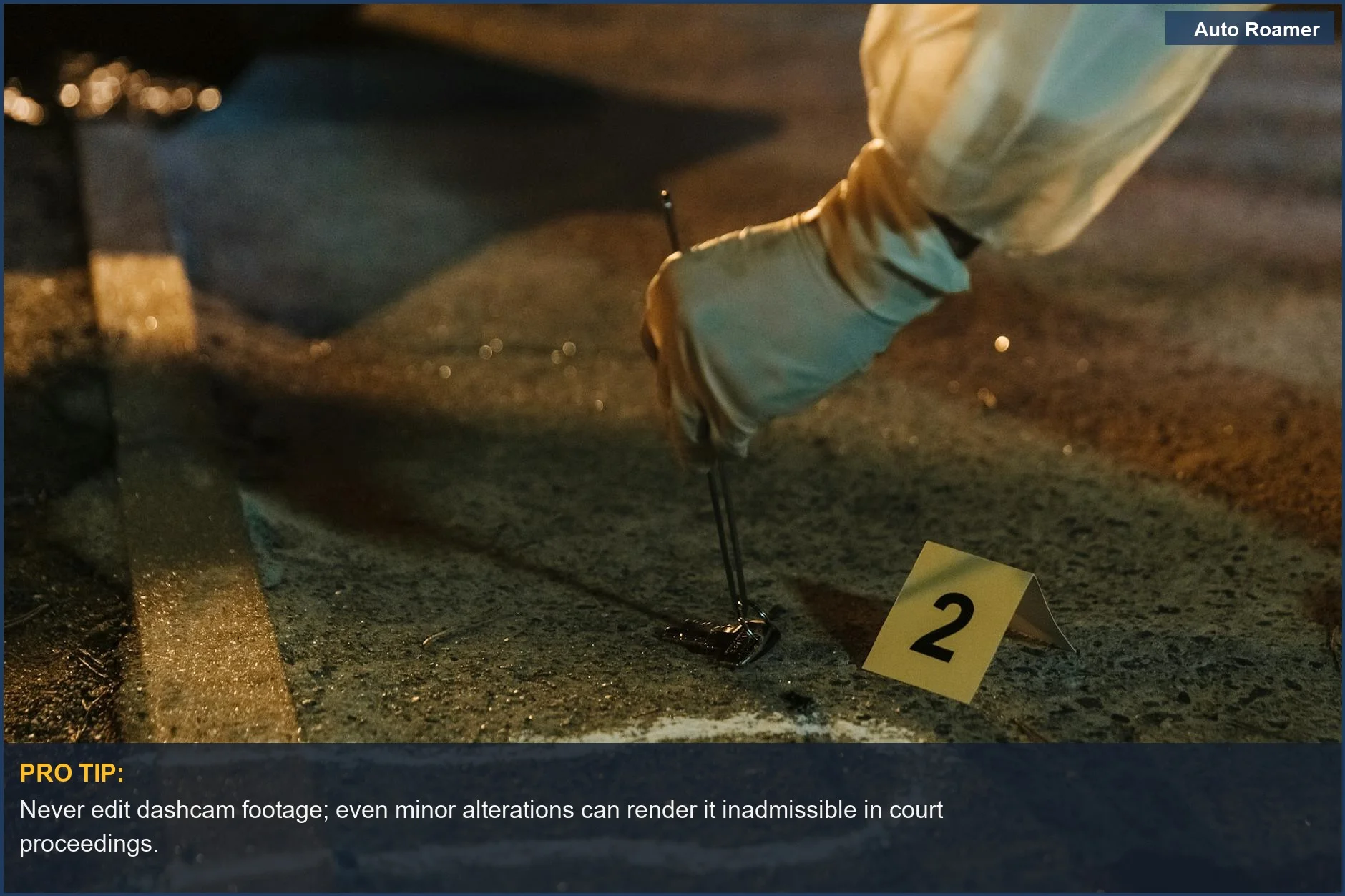 Forensic investigator carefully collecting critical dashcam footage evidence at a night crime scene.
