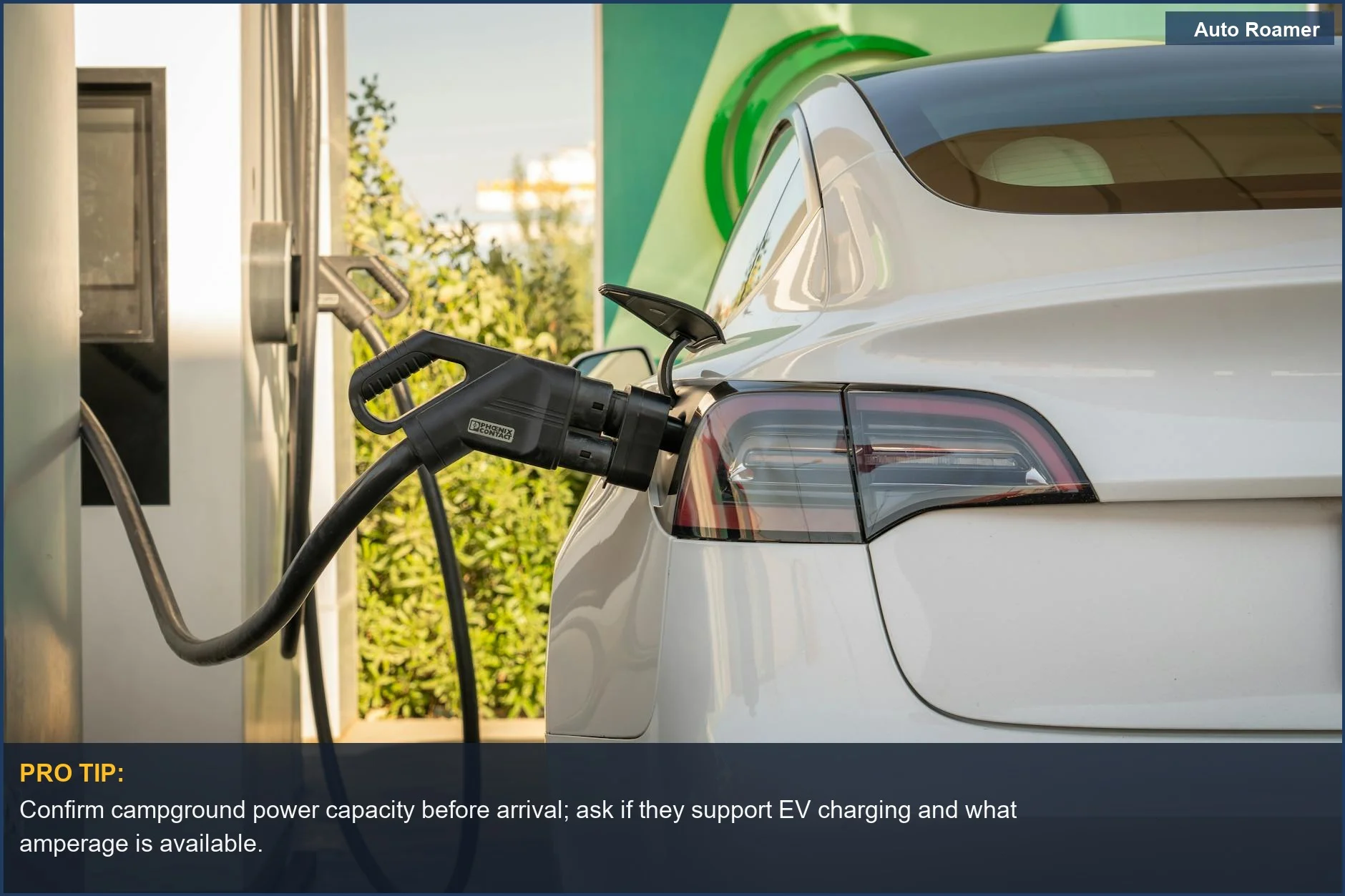 Electric Tesla charging at an outdoor station in Erbil, Iraq, showcasing eco-friendly EV charging options.