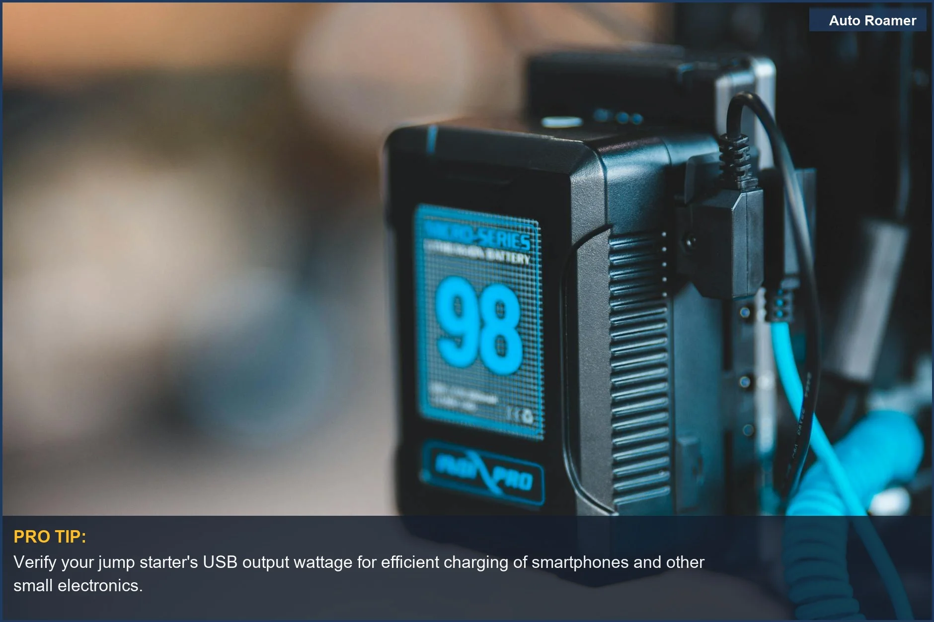 Close-up of a high-capacity portable battery with a digital display showing 98 percent charge, highlighting multi-functionality.