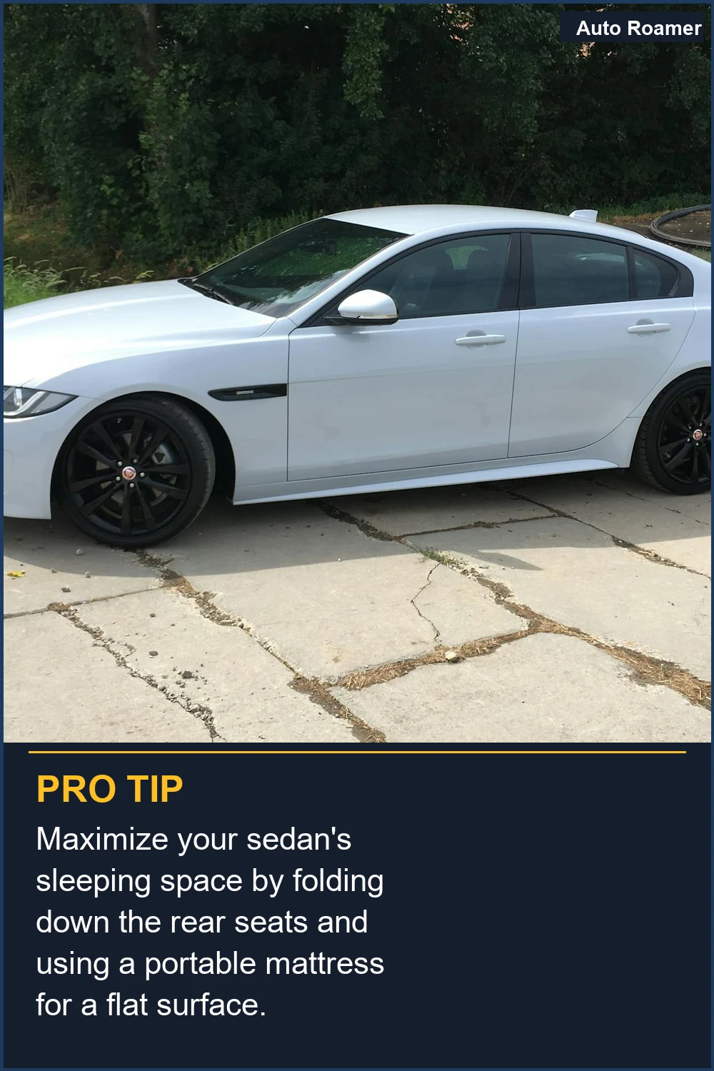 Maximize your sedan's sleeping space by folding down the rear seats and using a portable mattress for a flat surface.