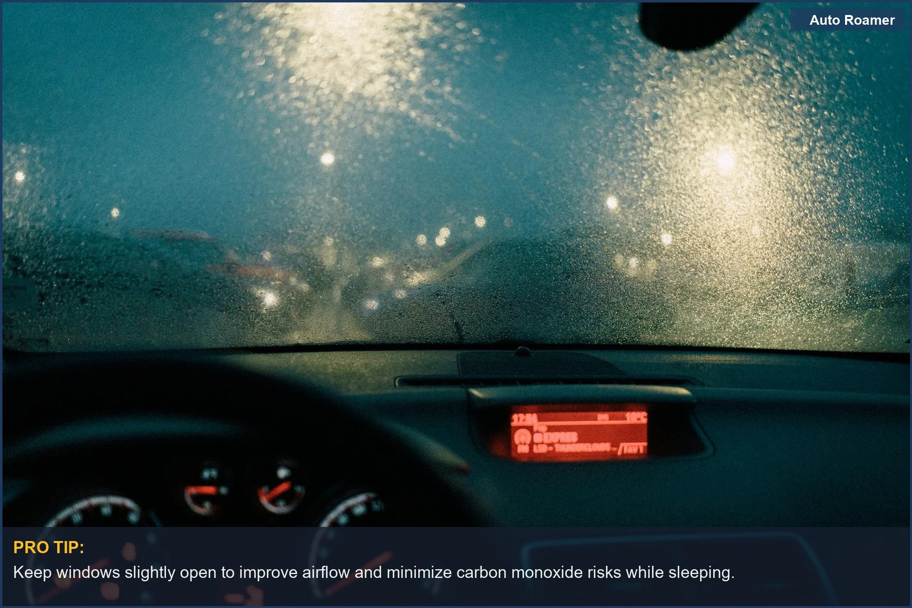 Interior view of a car with raindrops on the windshield, illustrating potential carbon monoxide hazards during sleep.