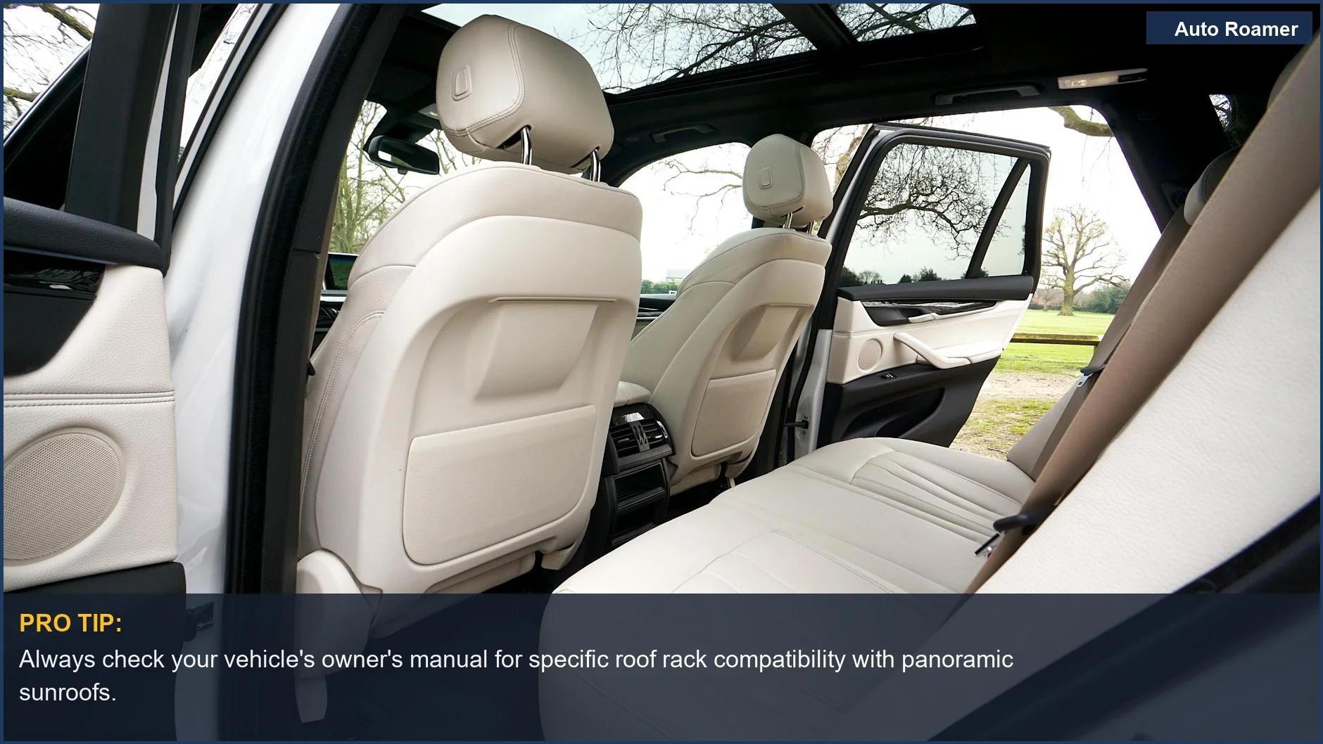 Luxurious BMW SUV interior with leather seats and panoramic sunroof, ideal for roof rack considerations.