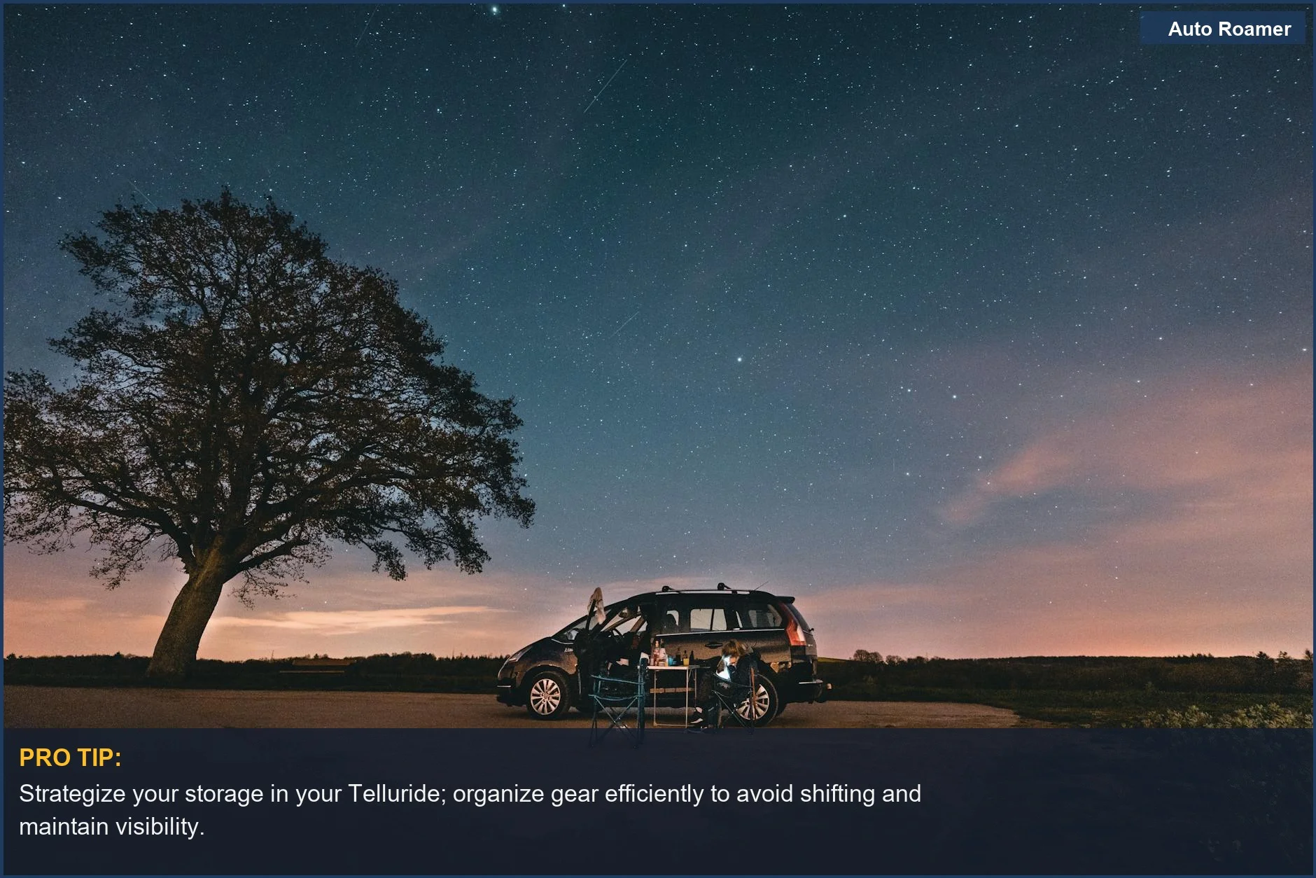 Black Kia Telluride SUV parked under a starry sky in a Belgian forest at night.
