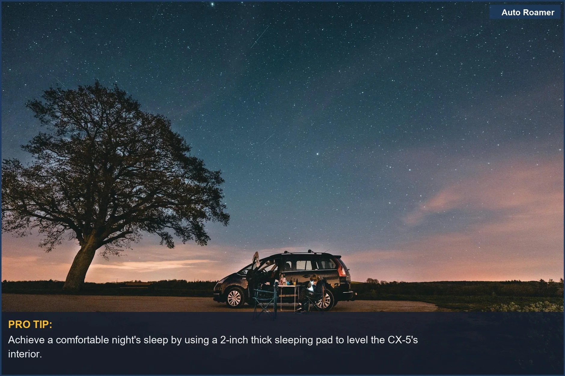 Black Mazda CX-5 under a starry night sky in Dinant, Belgium, ideal for serene car camping.