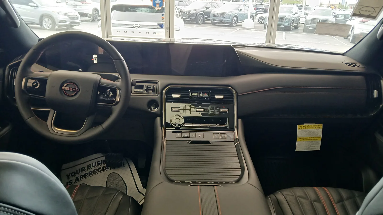 The dashboard and console of the redesigned Nissan Armada, the cabin you sleep inside