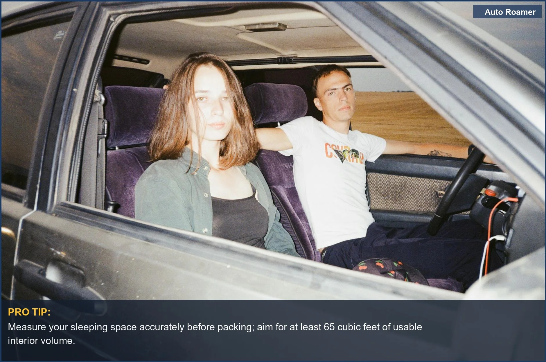 Couple enjoying a road trip in a Nissan Rogue, ideal for car camping adventures.