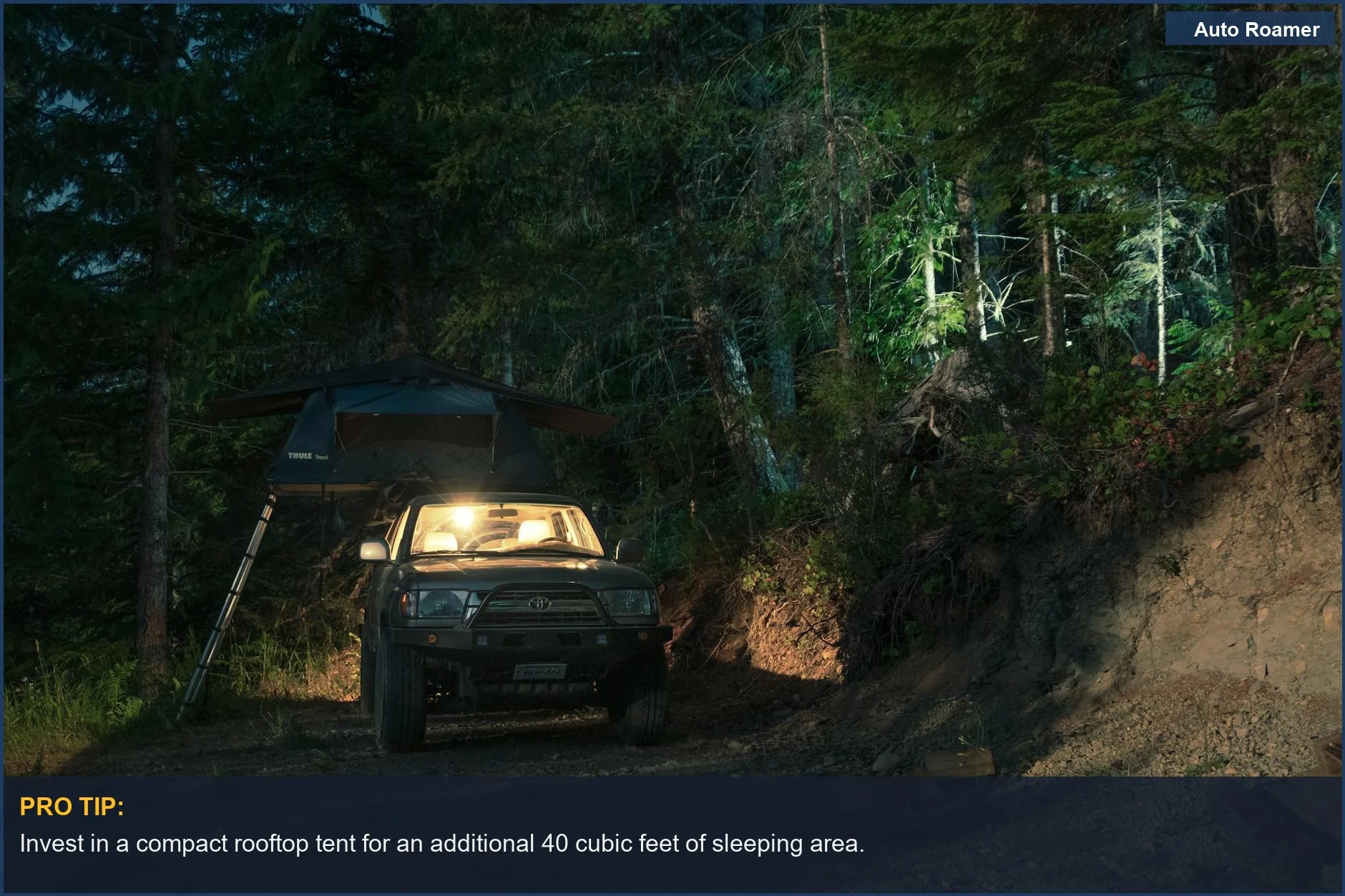 SUV with a rooftop tent parked in a dimly lit forest campsite at night.