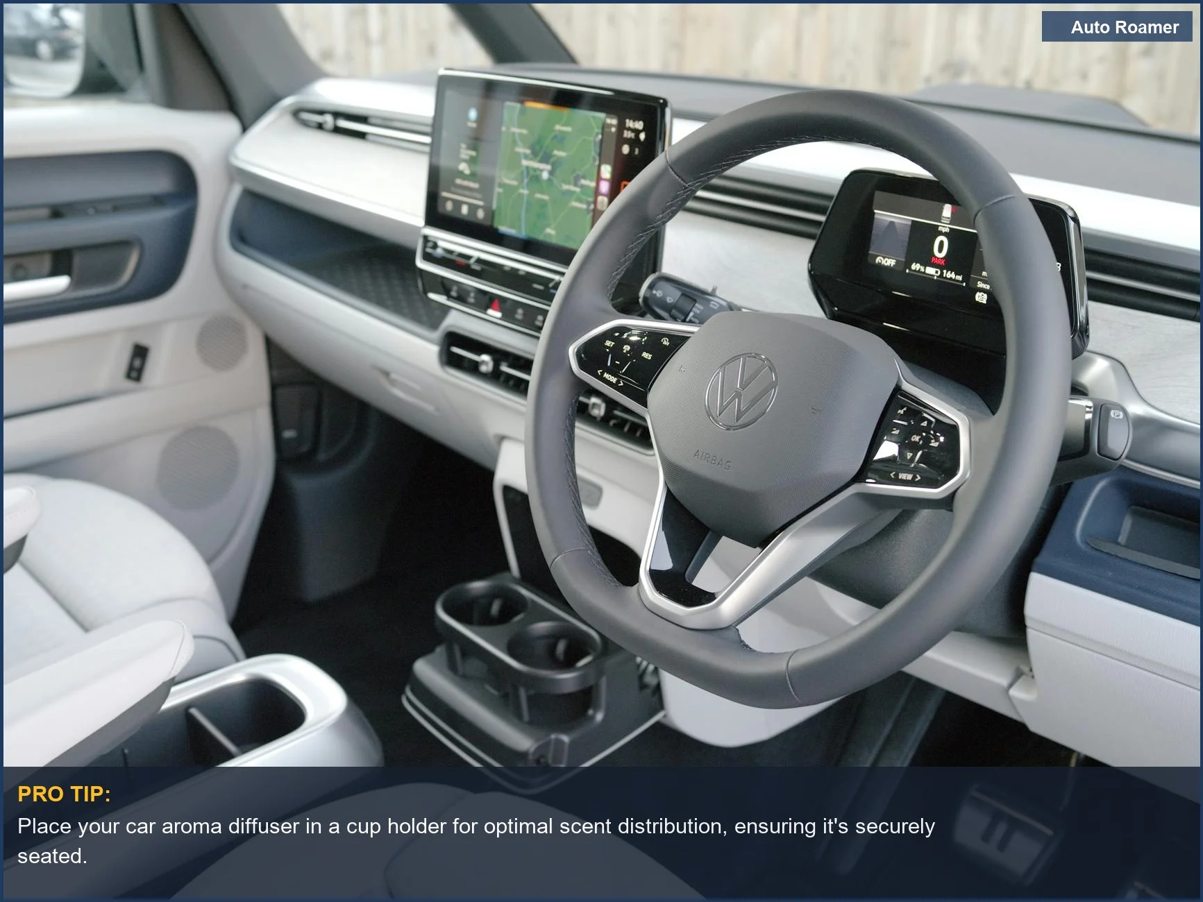 Modern car interior with digital dashboard, perfect for placing a car aroma diffuser in a cup holder.
