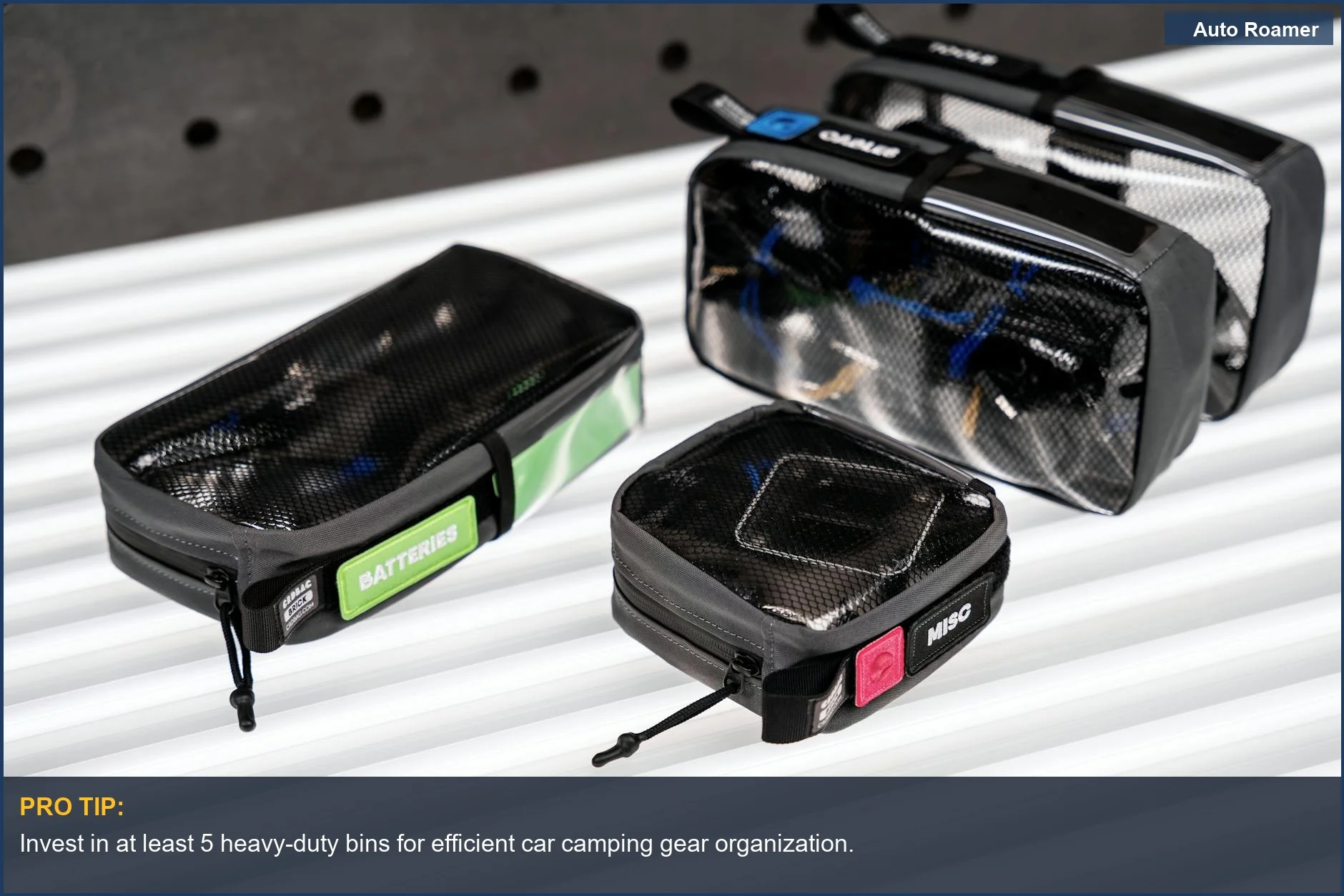 Organized car camping containers with clear lids for easy gear access and identification.