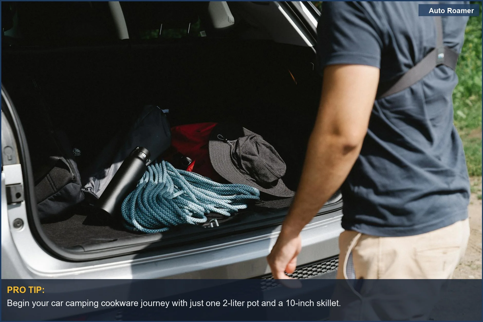 Man organizing camping gear in a car trunk, preparing for an adventure and considering camping pot size.