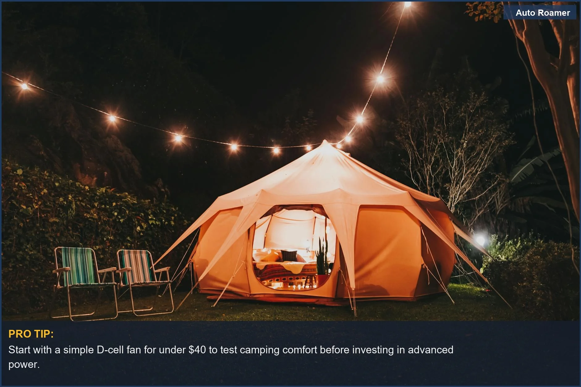 Cozy illuminated tent at a nighttime campsite, showcasing the need for efficient camping fan power.