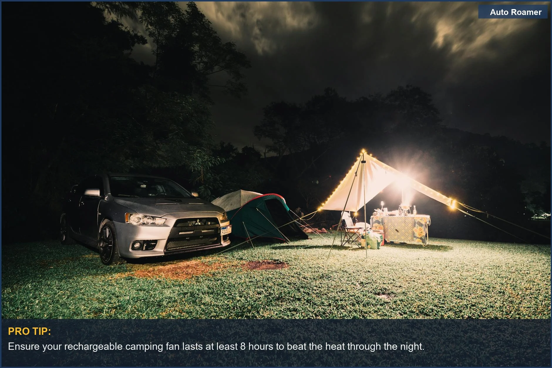 Serene night campsite with illuminated tents and a car under a cloudy sky, highlighting comfort with fan power.