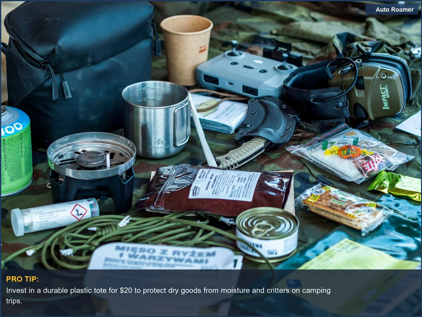 Assortment of camping gear and food including a durable plastic tote for food storage camping.