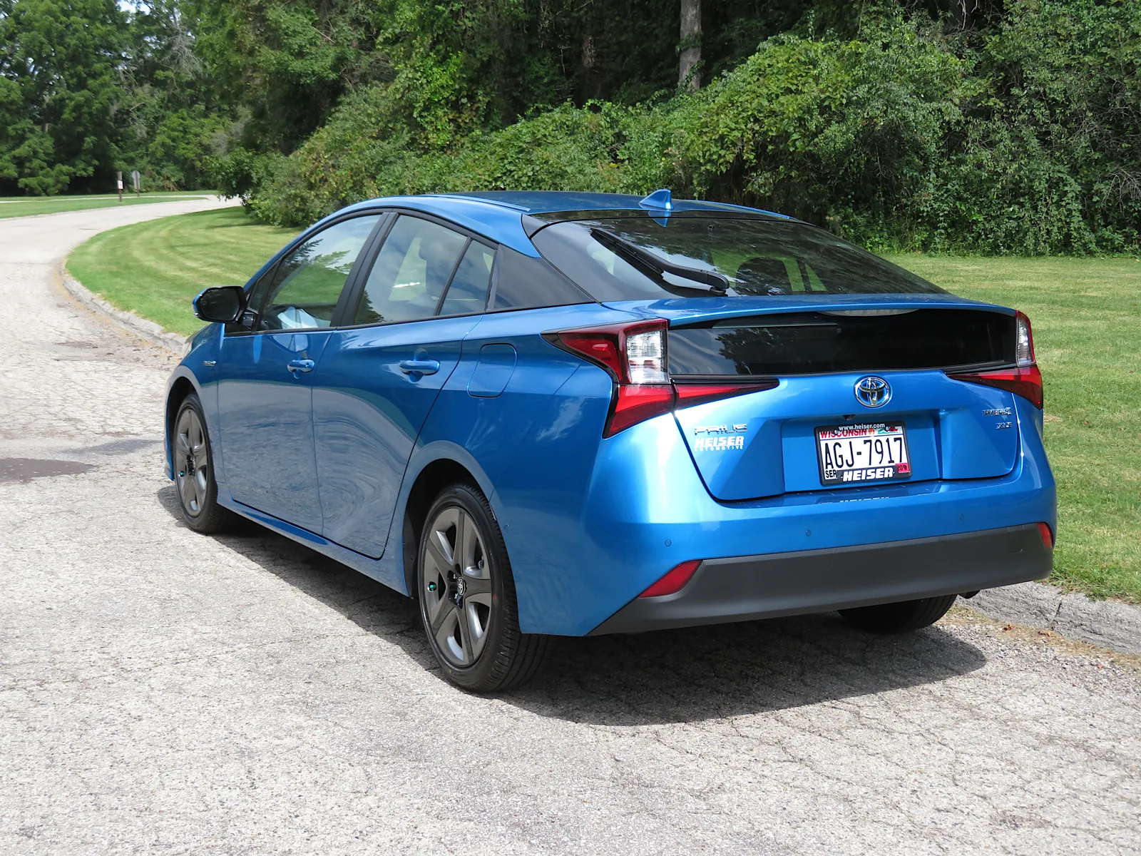 A blue Toyota Prius liftback parked outdoors, the car this camping mattress fit guide is built around