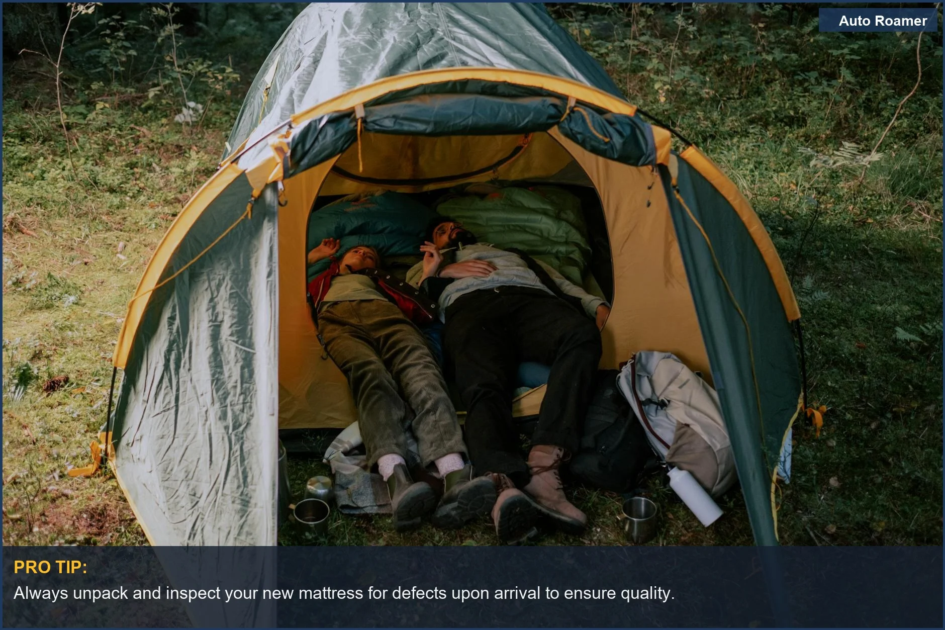 Couple rests peacefully inside a tent in a lush forest, perfect for a car camping mattress guide.