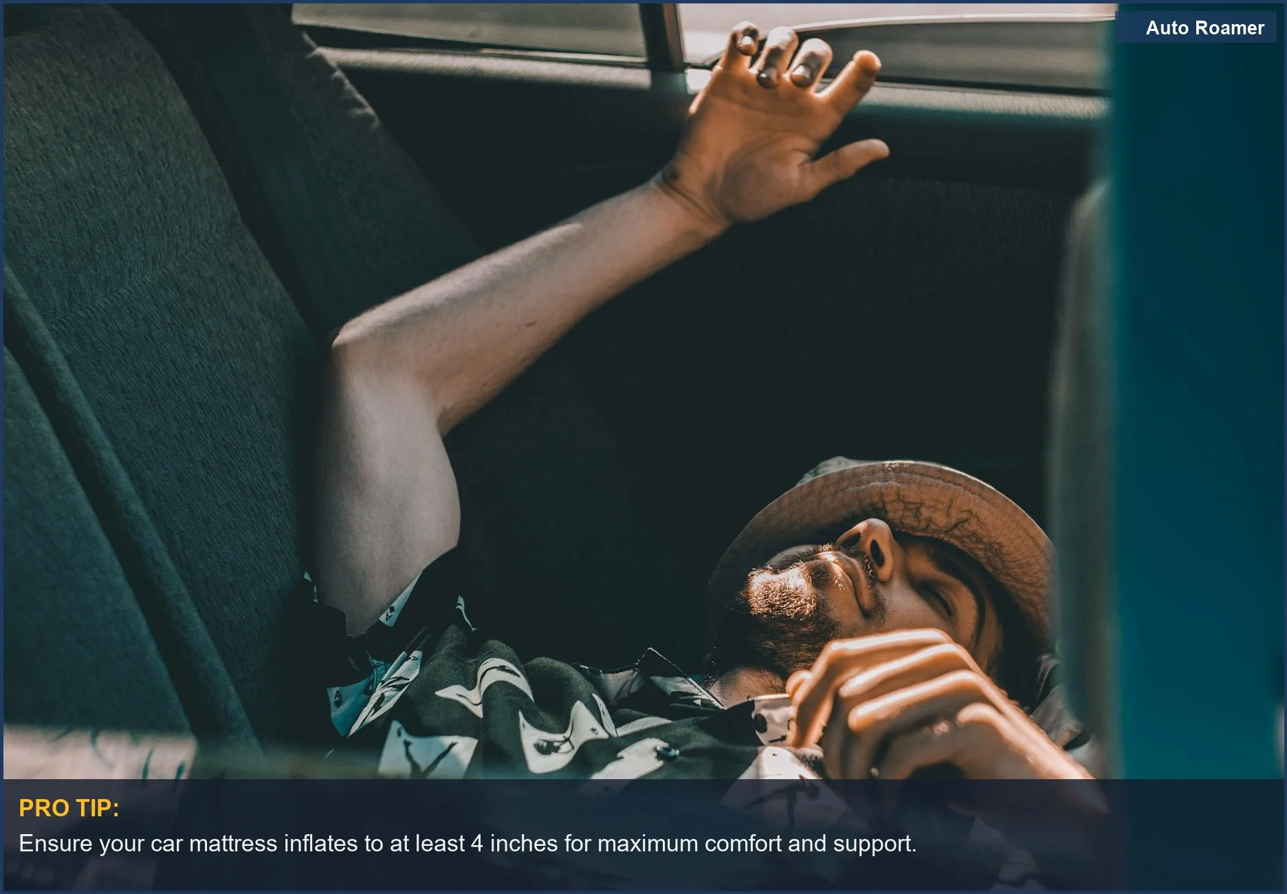 Man resting in a car backseat, highlighting the importance of car camping comfort for a good trip.