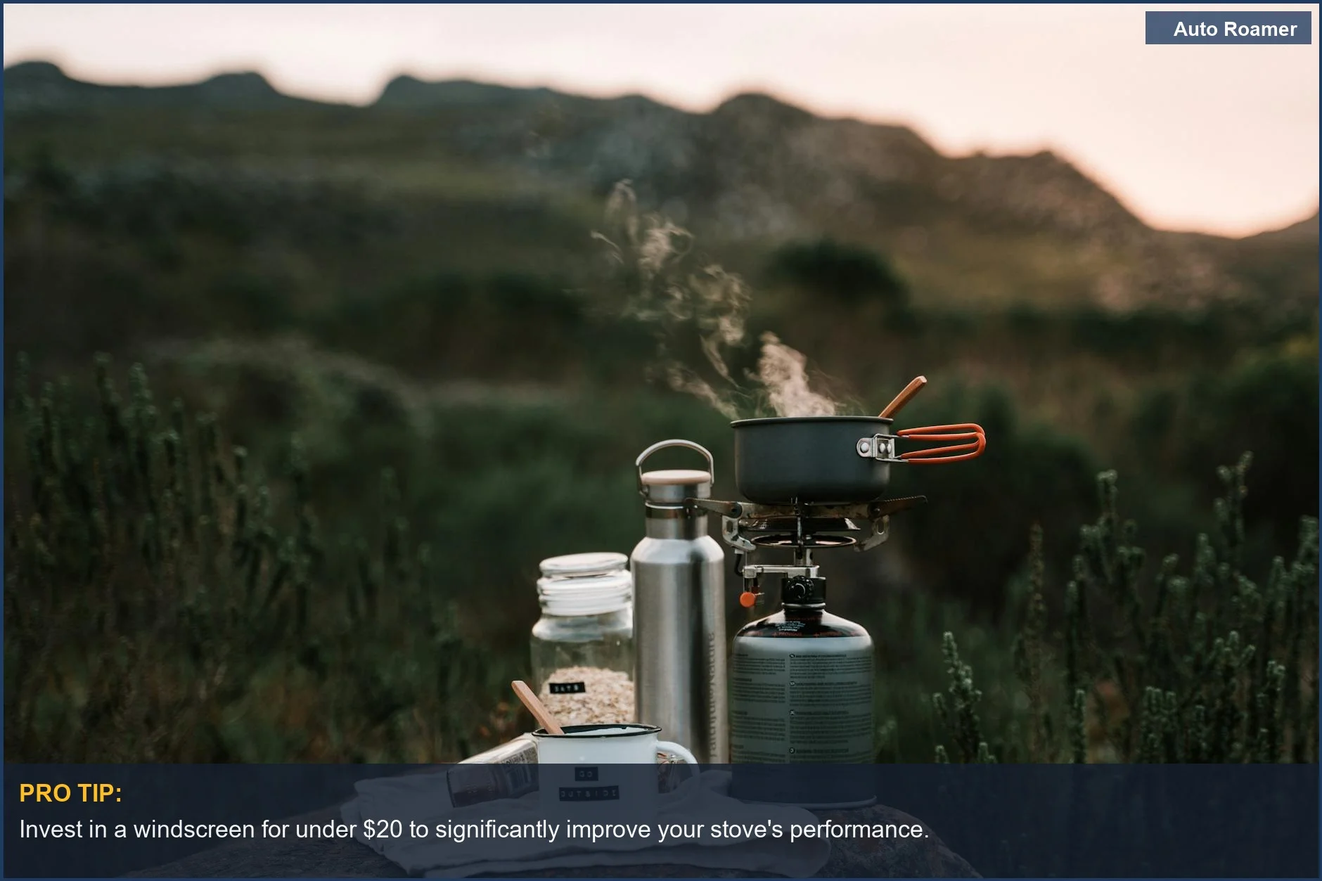 Basic single-burner car camping stove setup with pot and mug on a rock in nature.