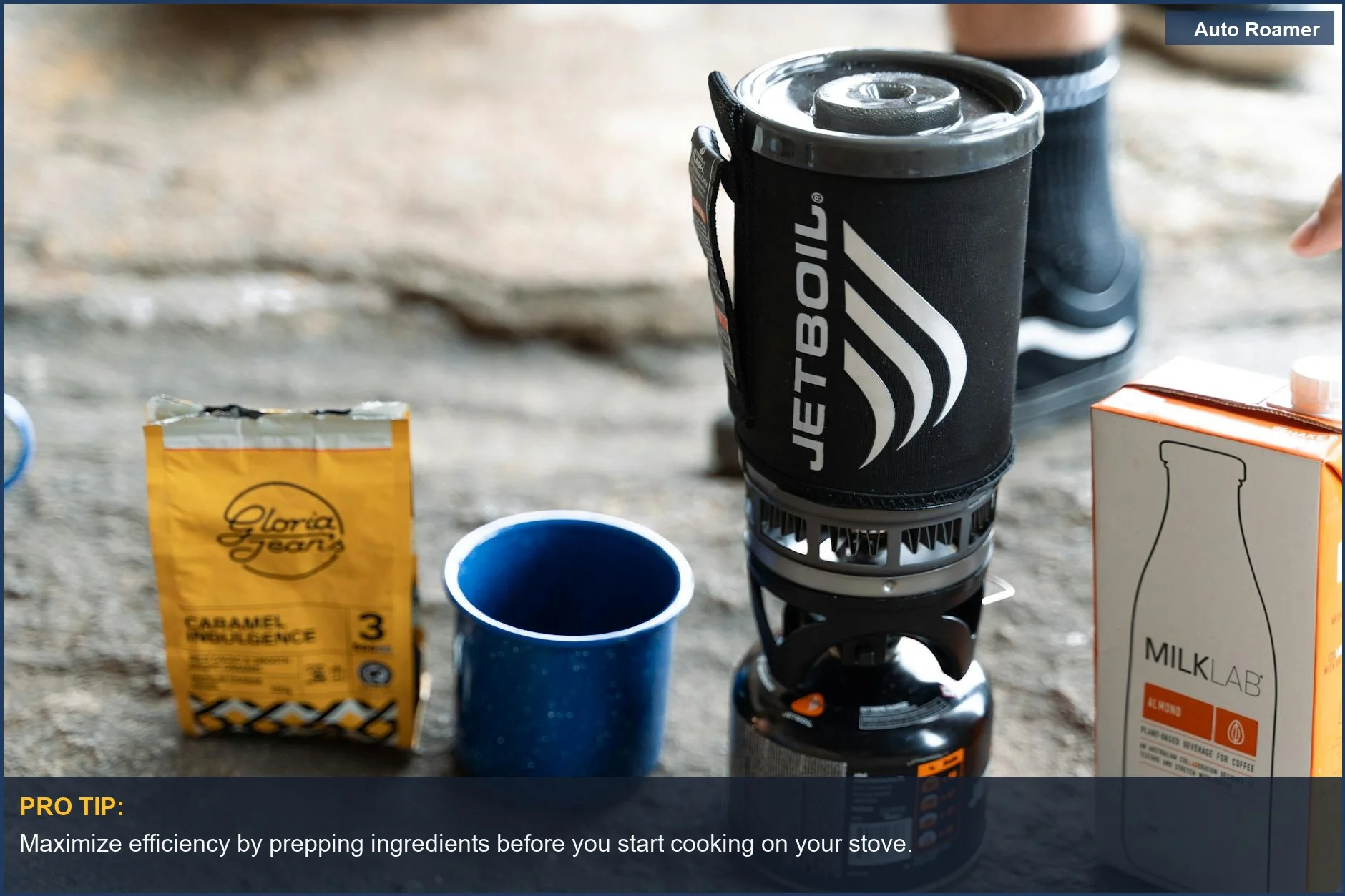 Two-burner car camping stove setup with coffee and milk, ideal for breakfast.