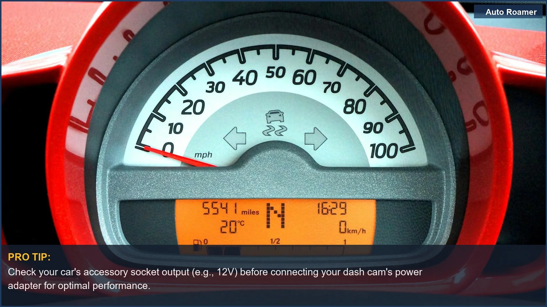 Modern car dashboard with illuminated speedometer and digital display, perfect for showcasing dash cam tech integration.