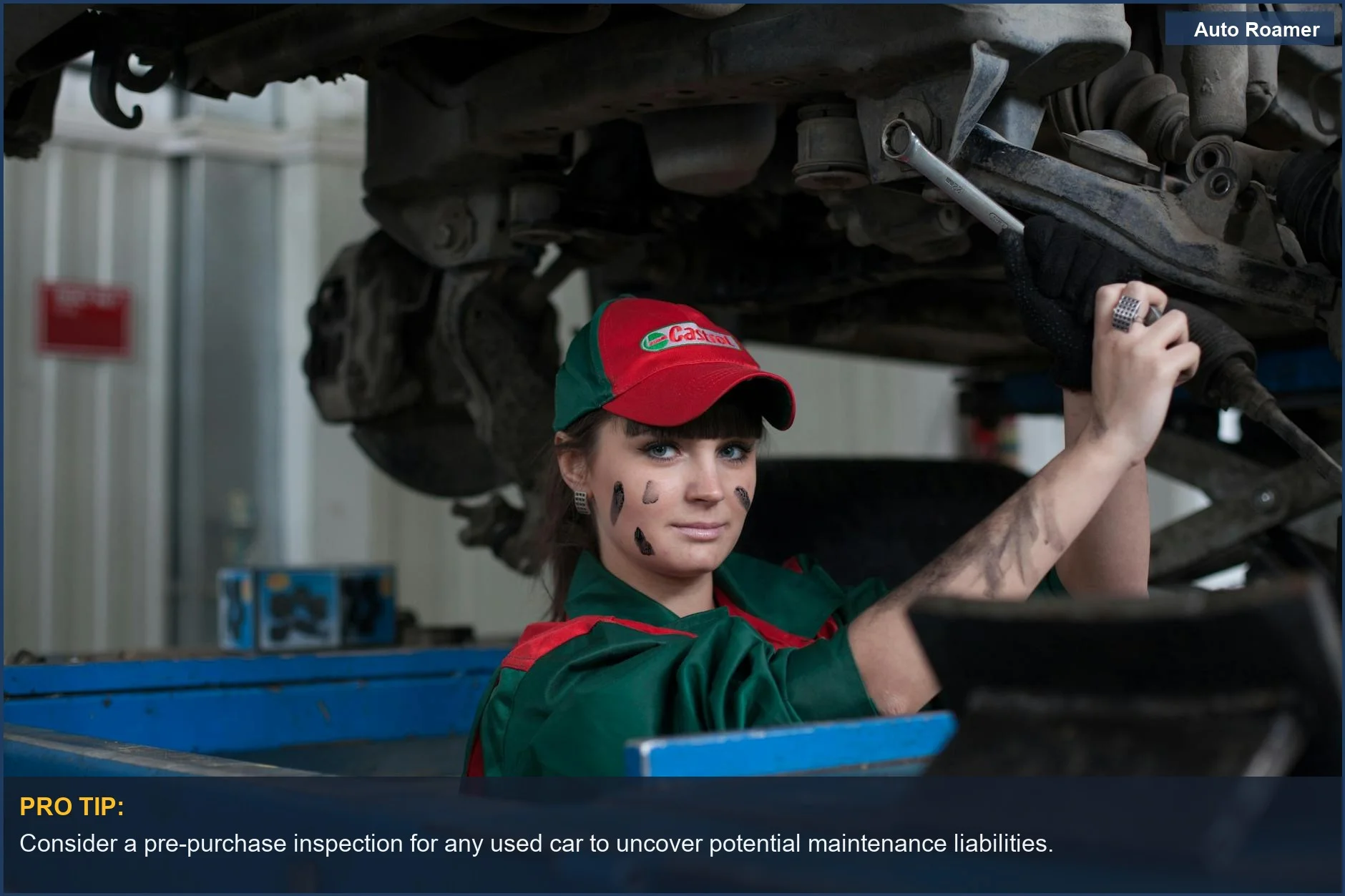 Female mechanic focused on car maintenance in a professional auto shop, demonstrating skill for different car brands.