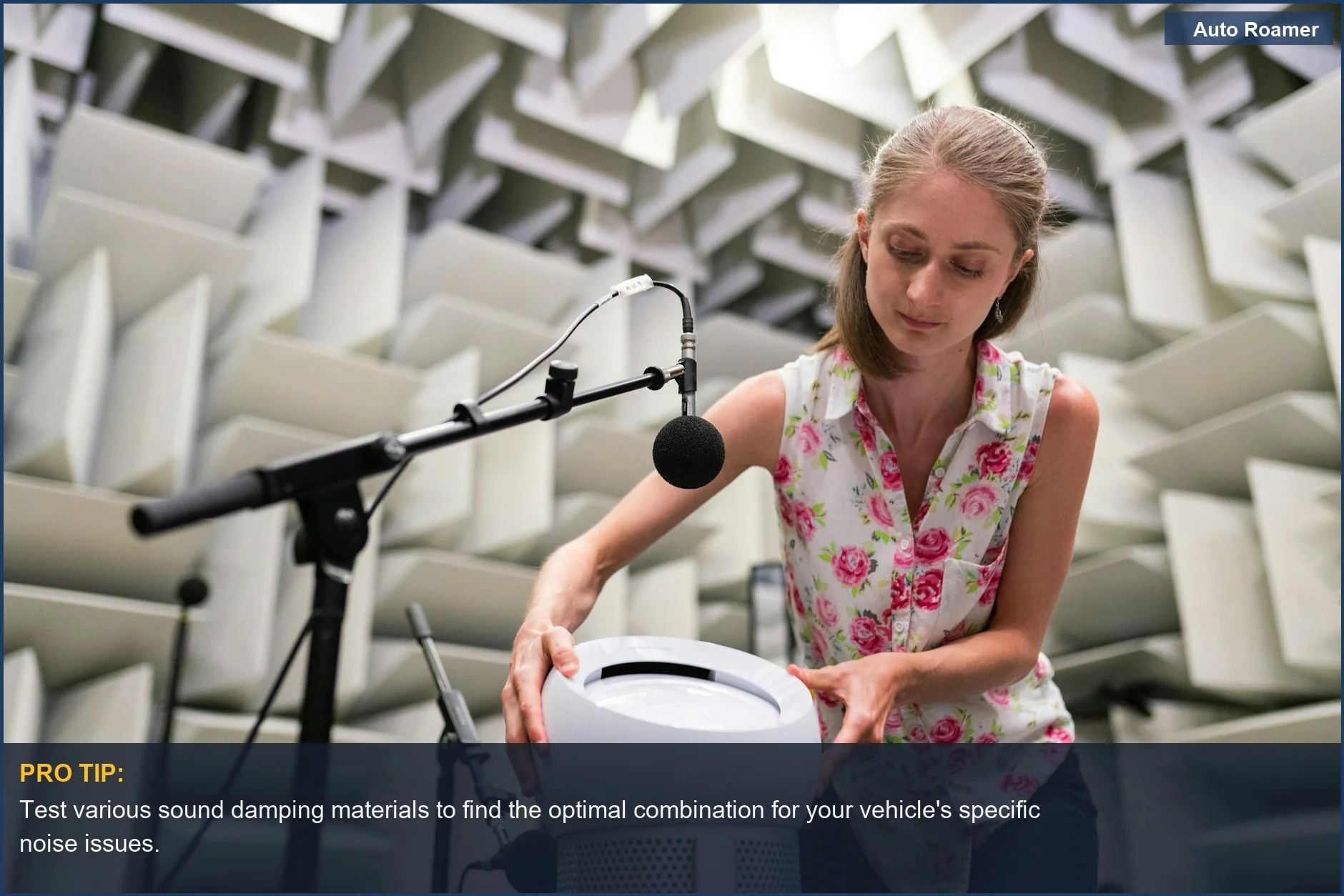 Engineer tests soundproofing materials in an anechoic chamber for effective car noise reduction.