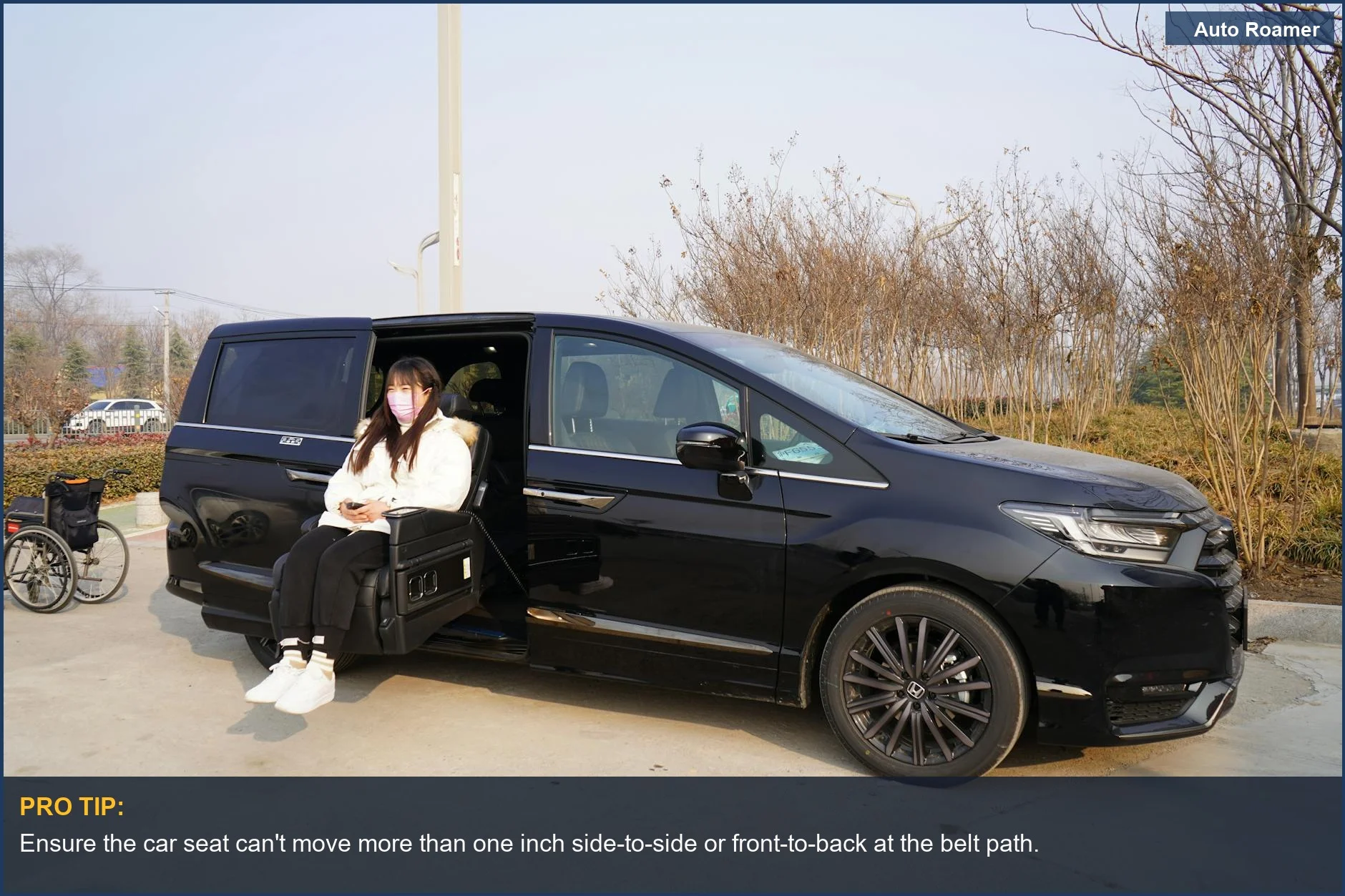 Woman installing a car seat, highlighting common car seat installation mistakes parents make.