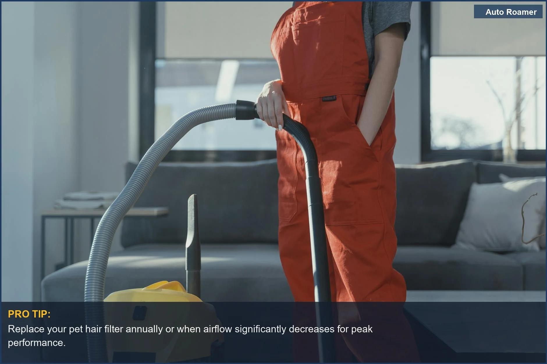 Professional cleaner demonstrating superior car vacuum maintenance with specialized pet hair filter attachments.