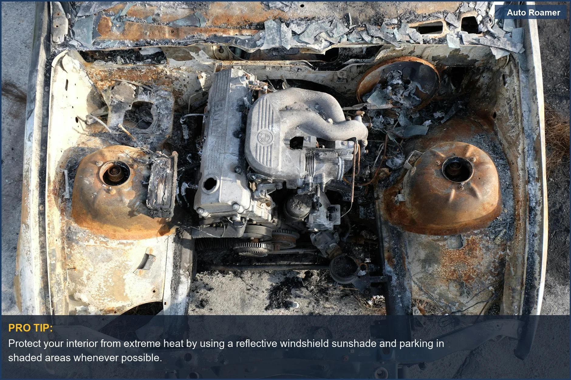 Aerial view of a burnt-out engine in an abandoned car, showing extensive wear and tear car interior.