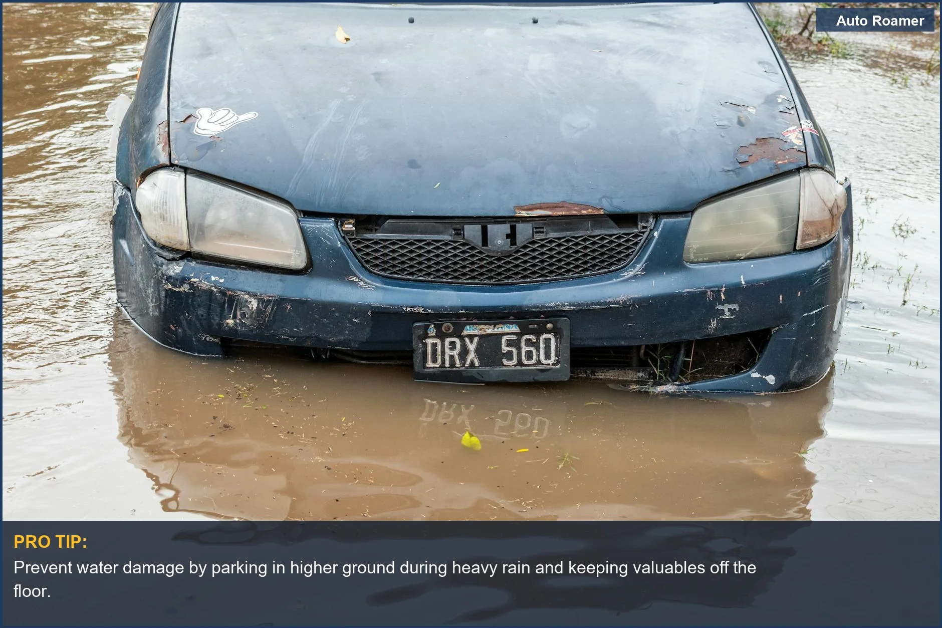 A submerged car in floodwaters, illustrating severe car interior damage from water exposure.