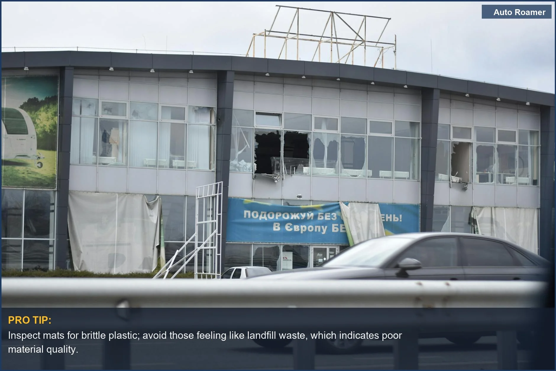 Shattered building windows highlight the severe risks associated with cheap floor mats and potential automotive hazards.