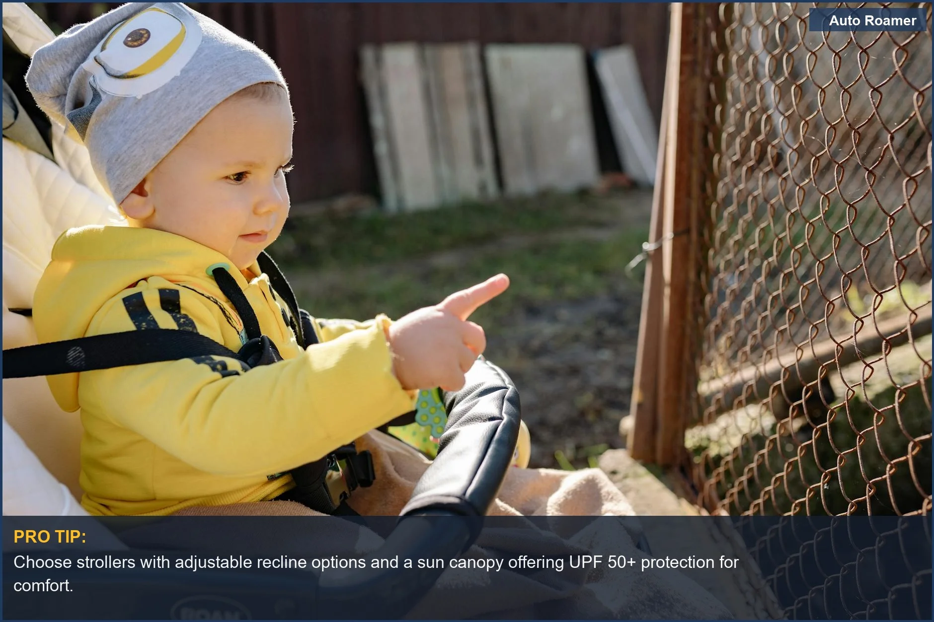 Adorable baby in stroller outdoors, symbolizing the importance of kid-friendly travel products for smooth journeys.