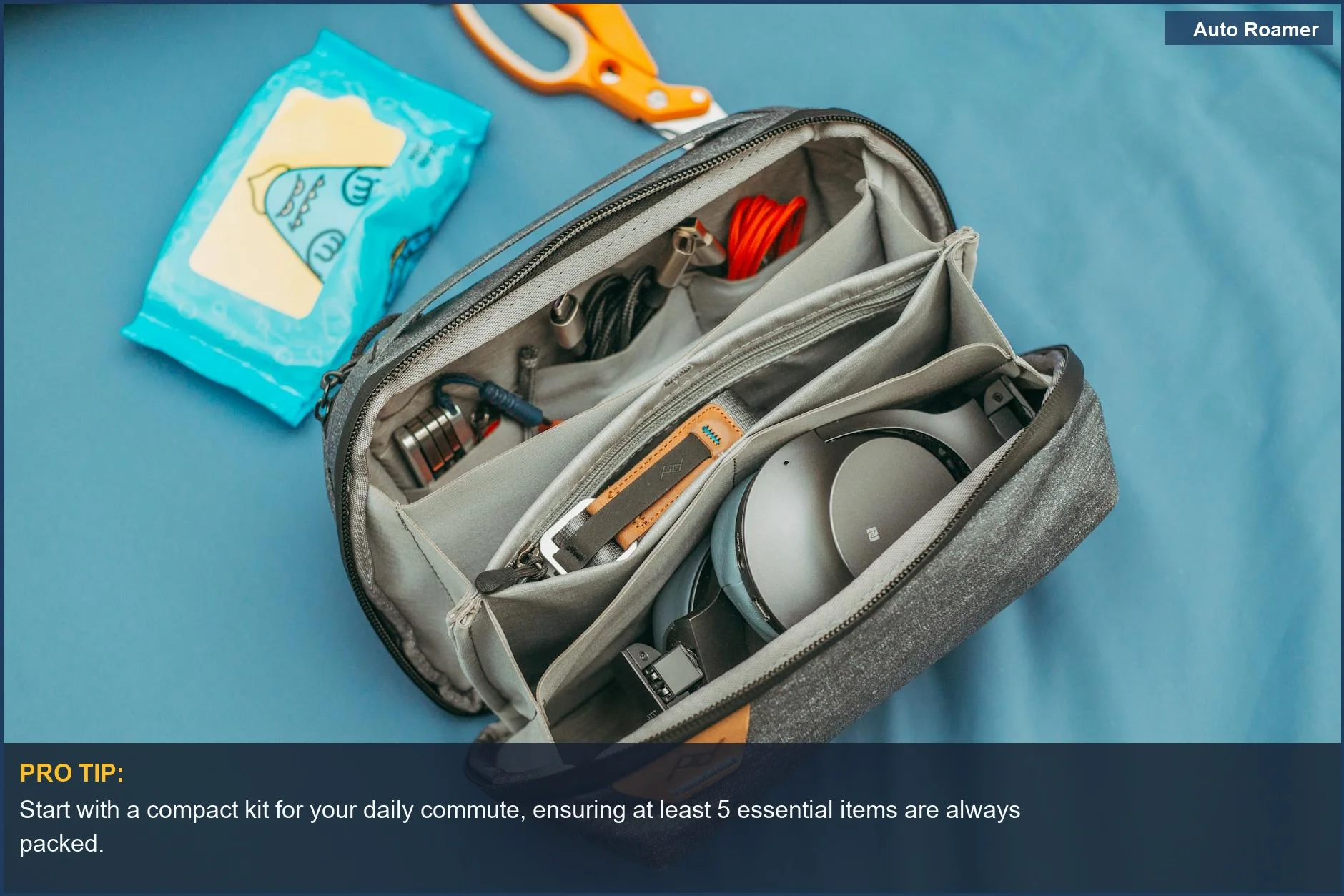 Organized car emergency kit essentials like cables and wipes for road trip preparedness.