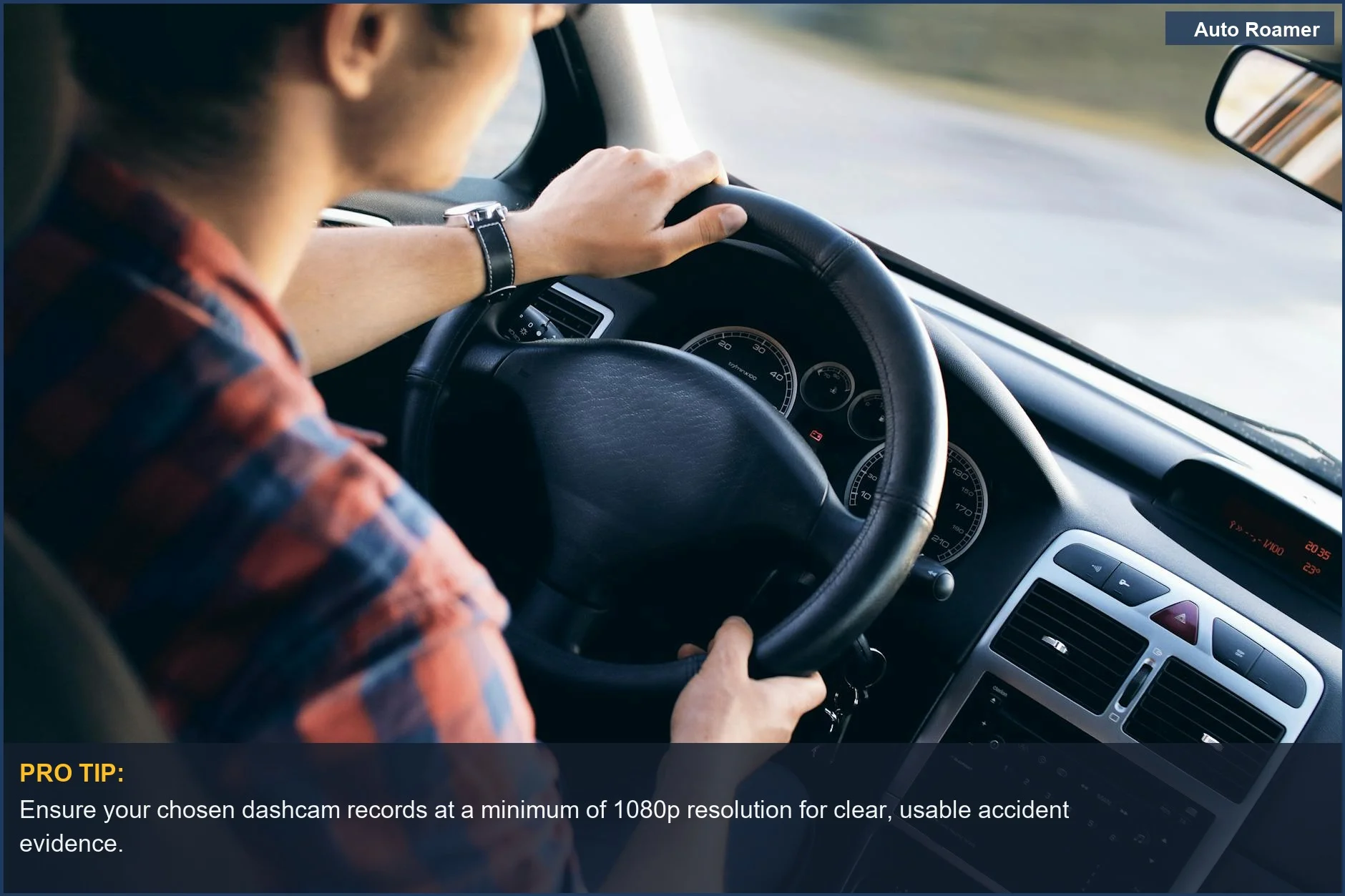 Close-up of a man driving a modern car's dashboard and steering wheel, highlighting car dashcam selection details.