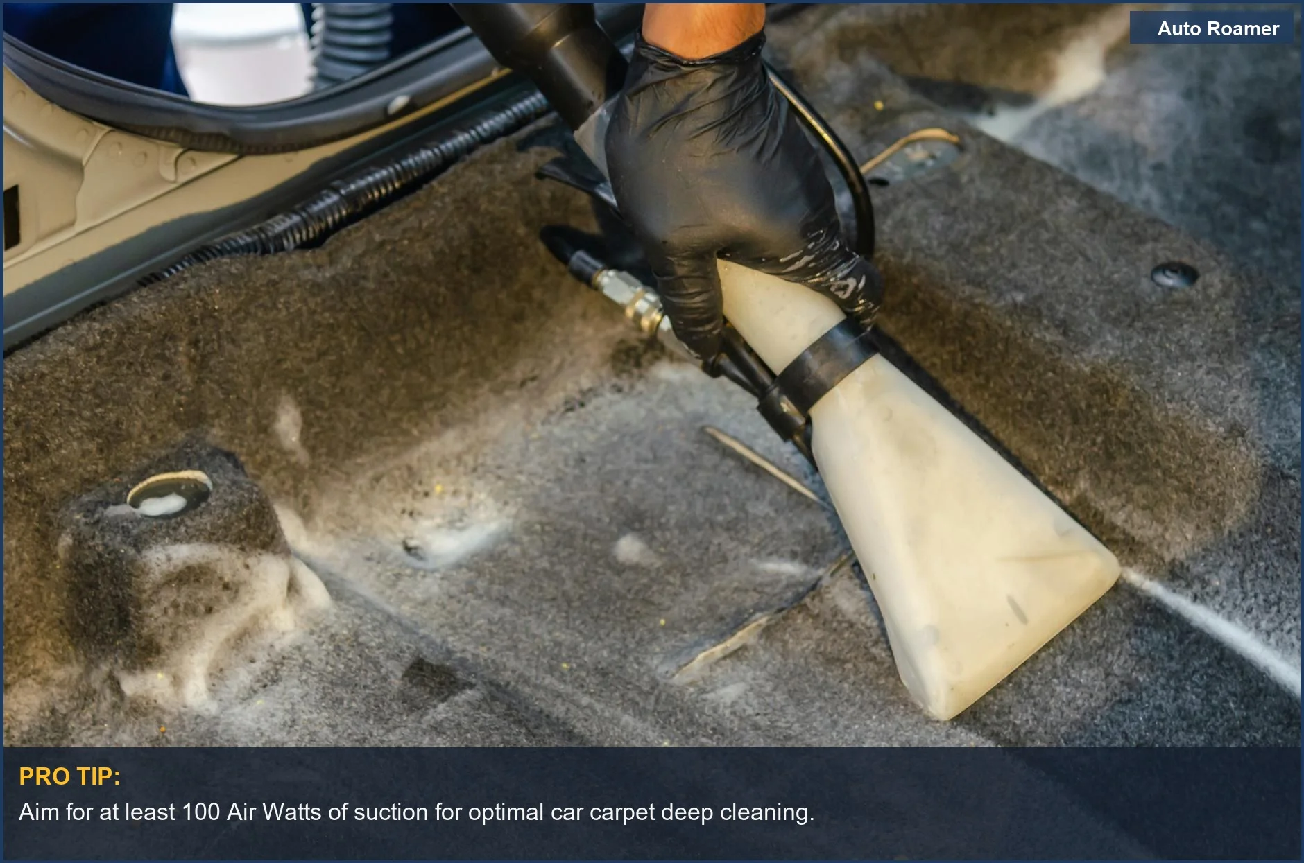 Thoroughly cleaning car interior carpet fibers with a cordless vacuum, effectively removing ground-in dirt and debris.