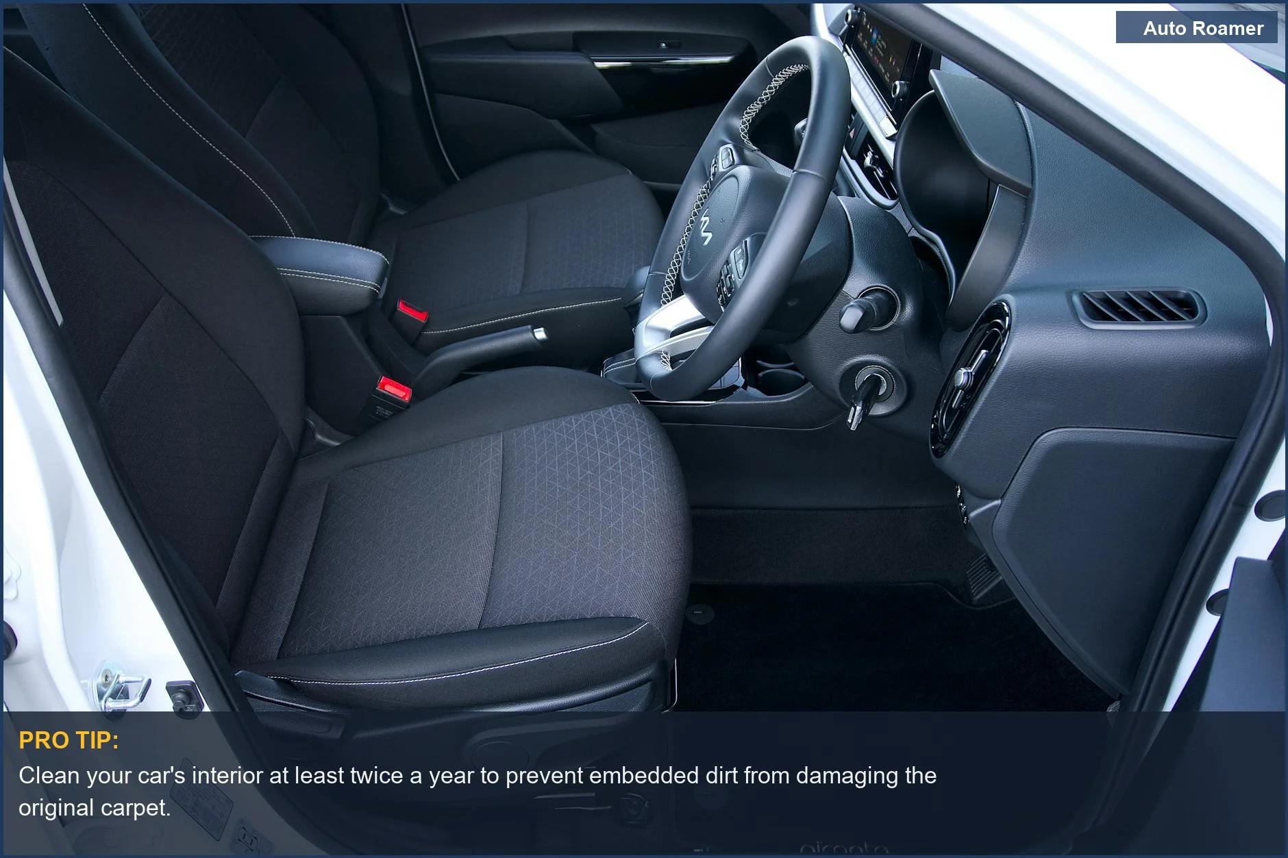 High-angle view of a clean Toyota Camry car interior, emphasizing the importance of protective floor mats.