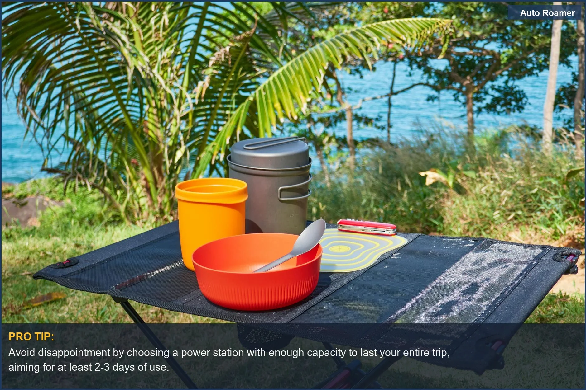 Ultralight camping gear set up by a tropical coast, illustrating the need for sufficient power station capacity on trips.