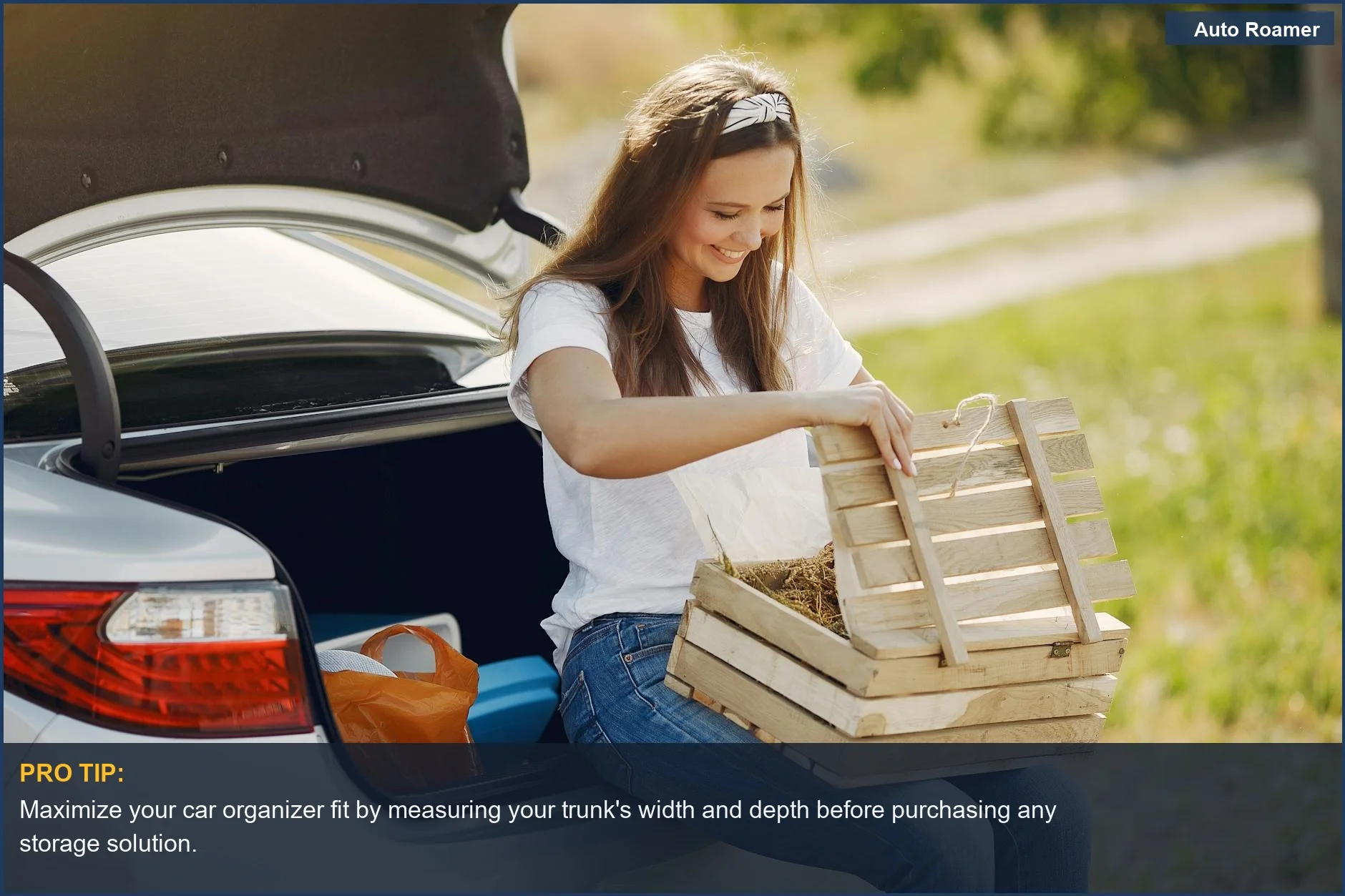 Woman happily organizing car trunk with various items, showcasing ample family car storage solutions.