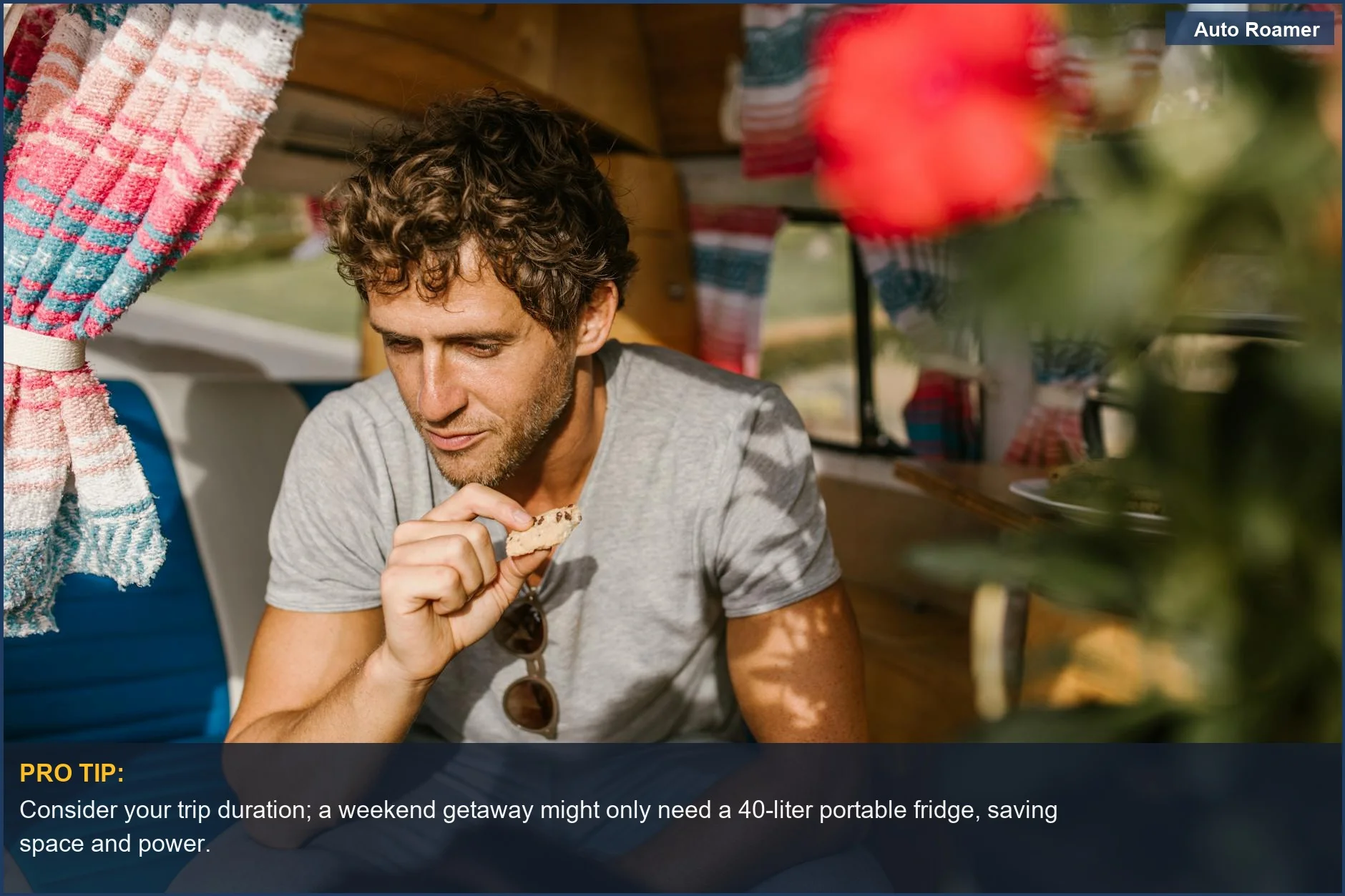 Man enjoying a snack from a portable fridge size guide in a campervan.