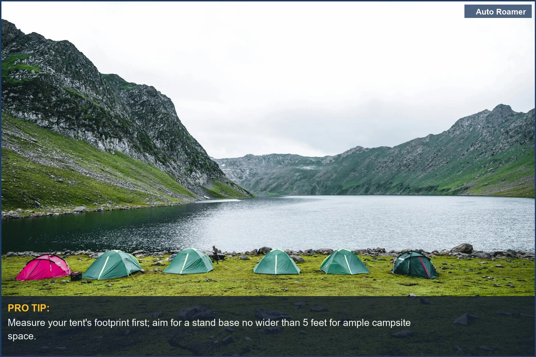 Peaceful lakeside campsite with tents and mountains, illustrating ideal portable hammock stand dimensions for scenic views.