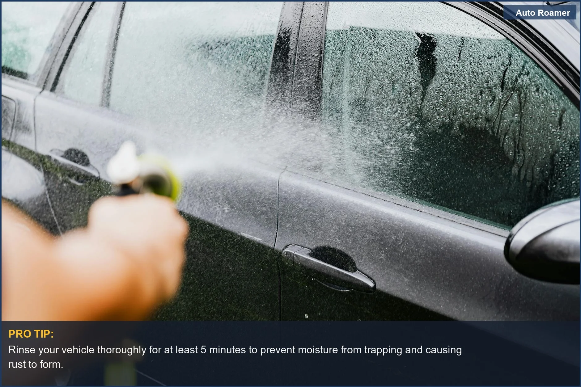 Hose spraying water on a car to clean off mud and debris after outdoor adventures.